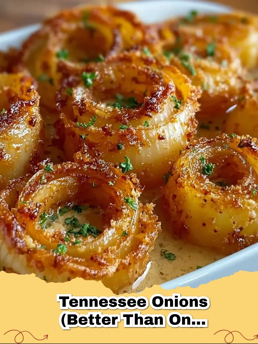A baking dish filled with golden brown Tennessee Cheesy Baked Sweet Onions, bubbly and delicious.