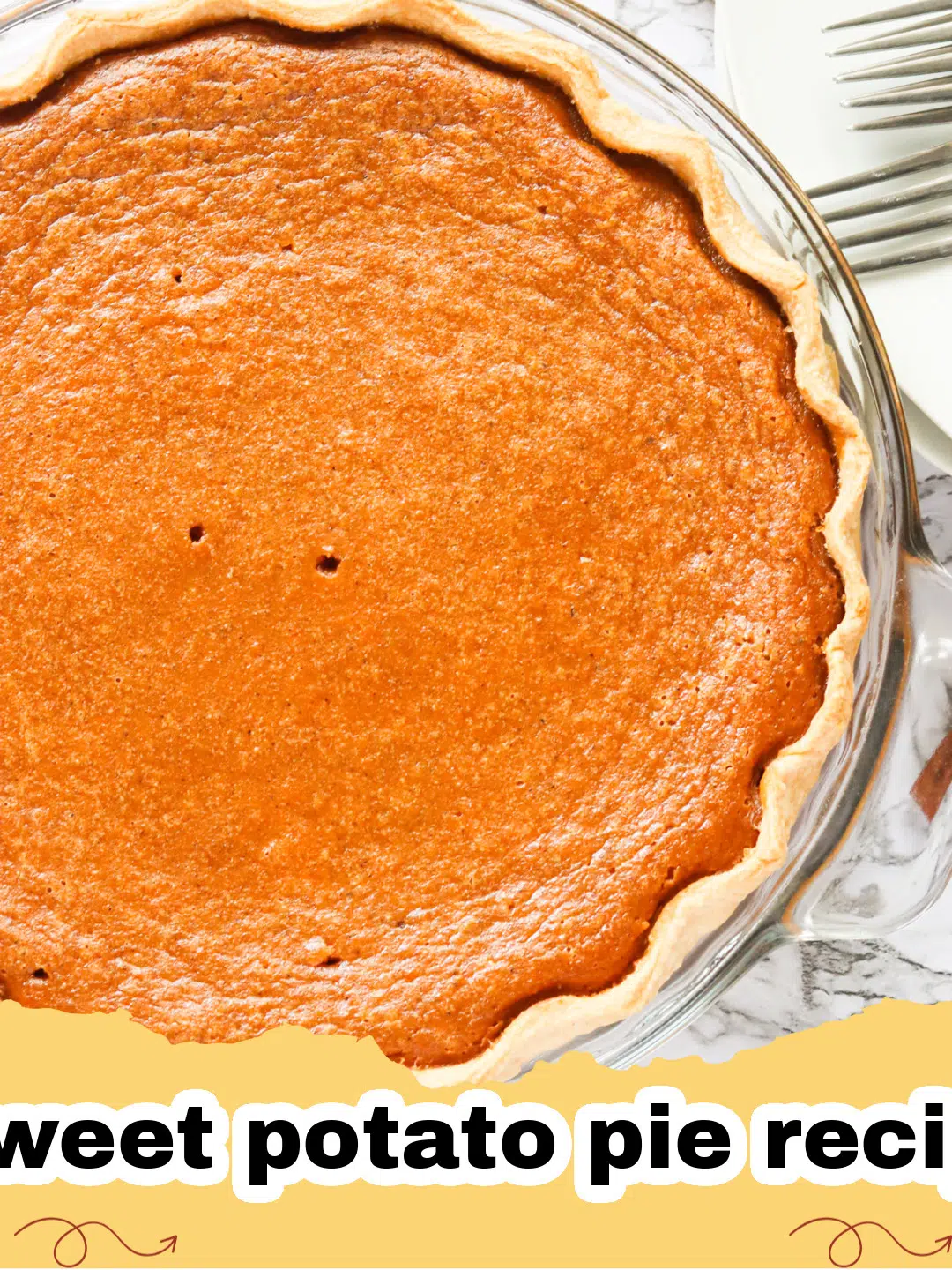 Slice of classic sweet potato pie with a dollop of whipped cream on a white plate