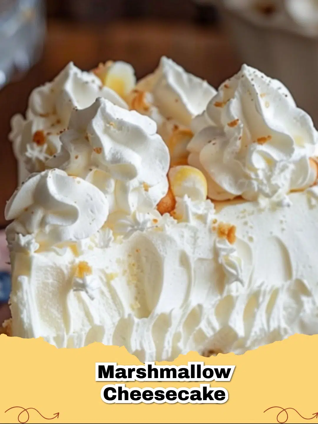 Decadent toasted marshmallow cheesecake slice with a fluffy golden topping