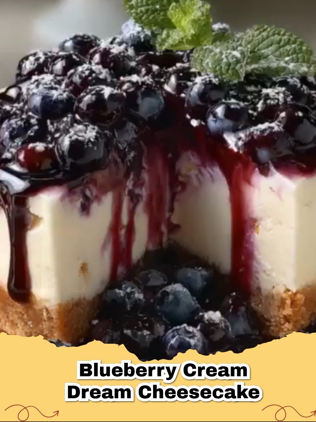 A beautiful slice of Blueberry Cream Dream Cheesecake with deep purple swirls and a graham cracker crust.