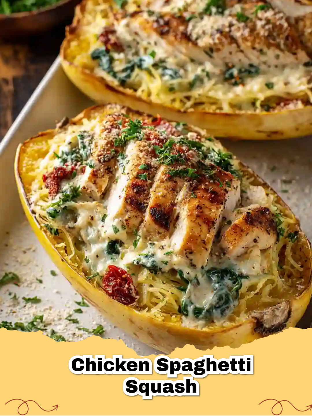A close up photo of a Cheesy Chicken and Spinach Spaghetti Squash boat topped with melted mozzarella and parmesan cheese.