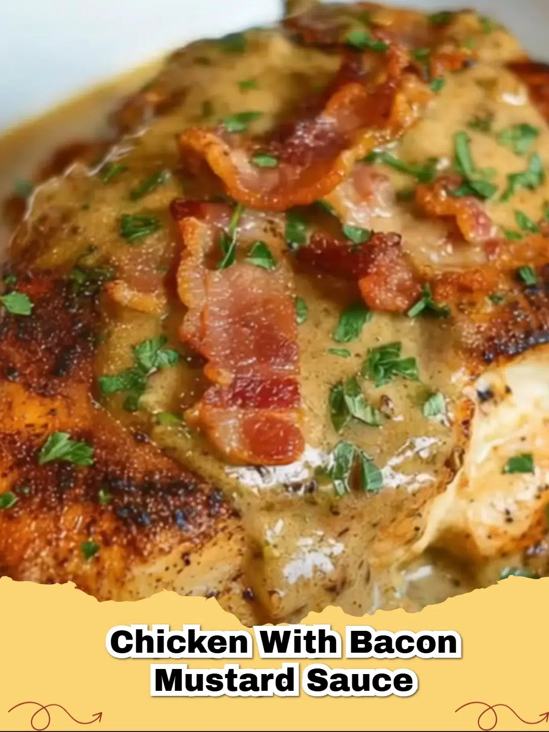Pan-seared chicken breasts smothered in a creamy bacon mustard sauce with fresh herbs.