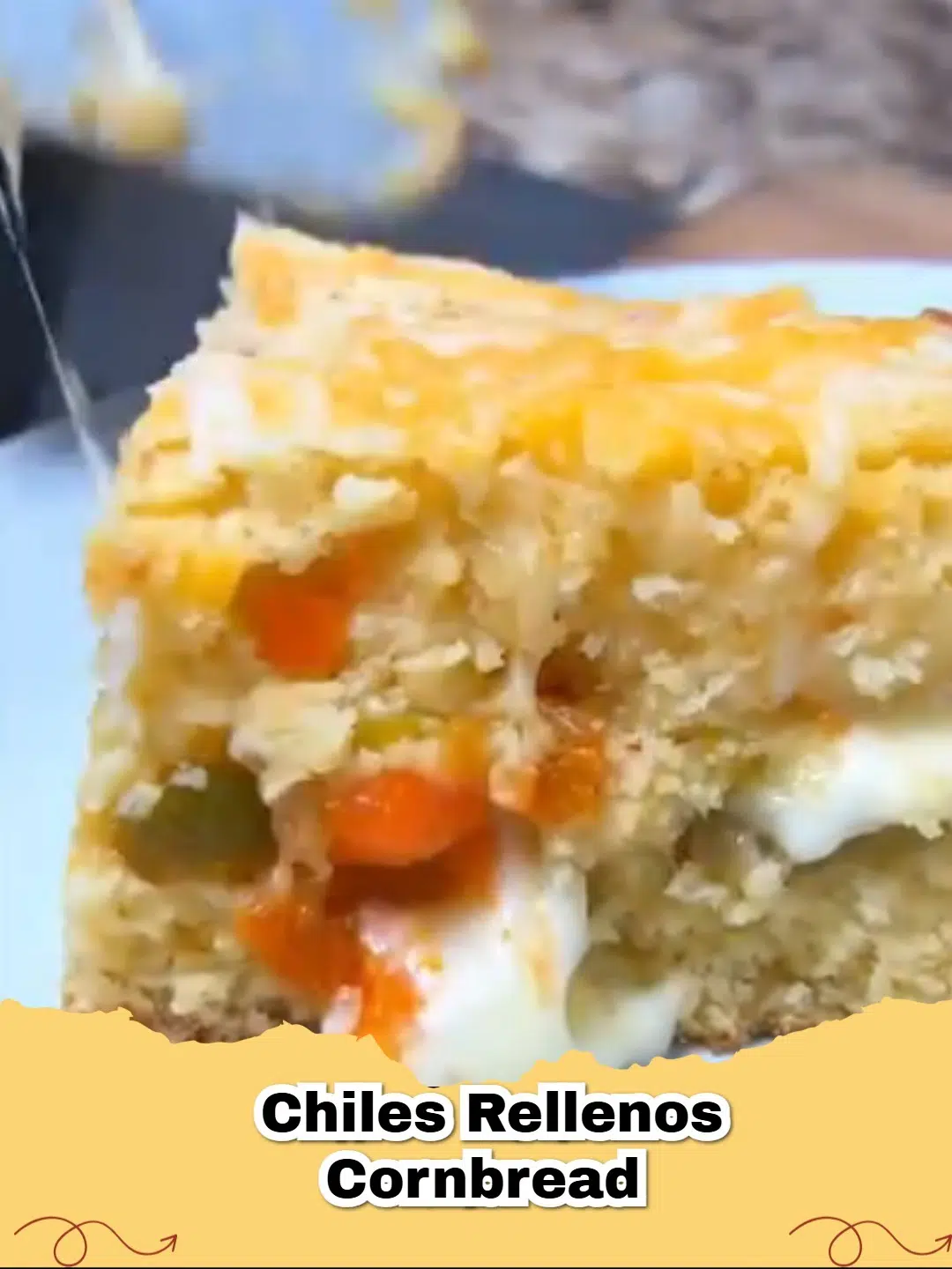 A golden-brown Chiles Rellenos Cornbread with melted cheese on top, garnished with fresh cilantro, ready to be served.