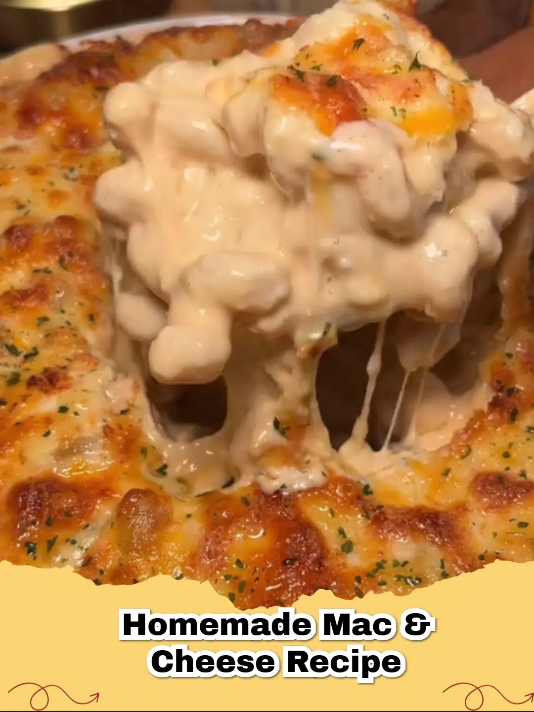 A close up of a serving of baked Delicious Homemade Mac & Cheese with a golden brown crust.