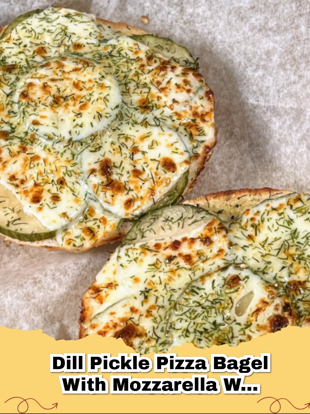 Close up of a Dill Pickle Pizza Bagel with Mozzarella with a sprinkle of Parmesan showing melted cheese and green pickles.