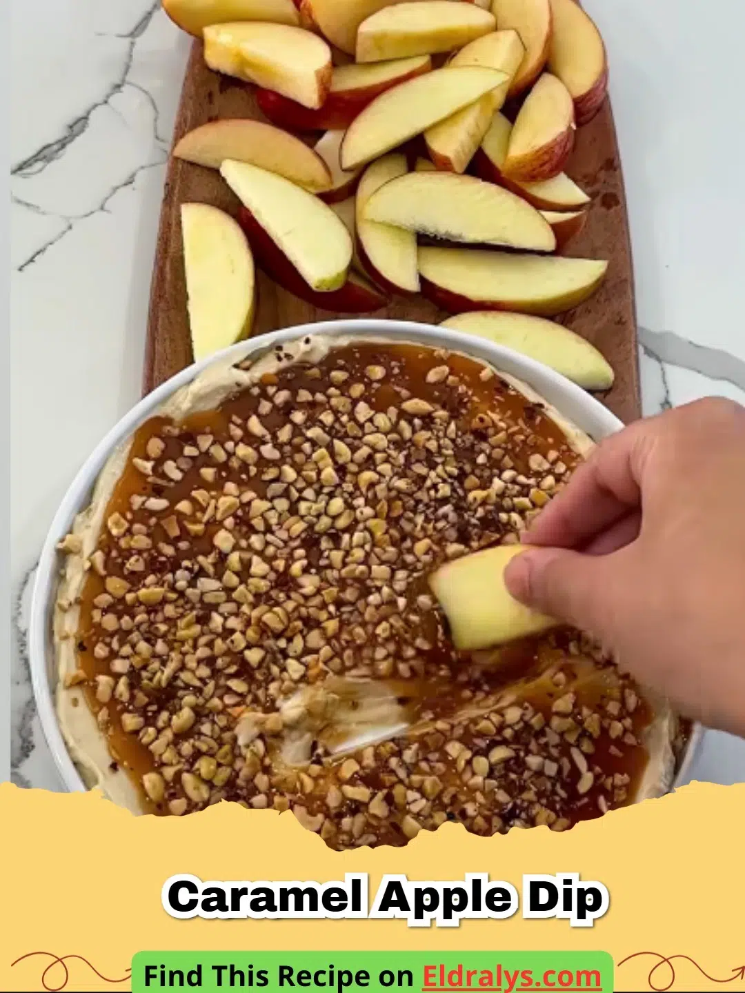 A close-up of Easy Caramel Apple Cream Cheese Dip with apple slices on a wooden board.