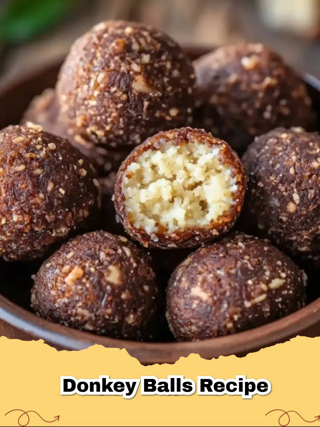 A plate of Easy Cheesy Ground Beef Meatballs with melted cheese oozing out of the center.