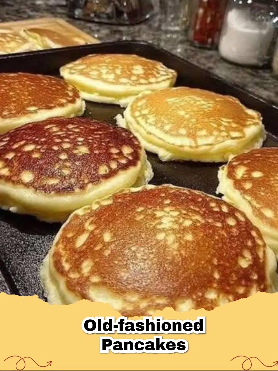 A tall stack of Easy Fluffy Old-Fashioned Pancakes topped with butter and dripping maple syrup