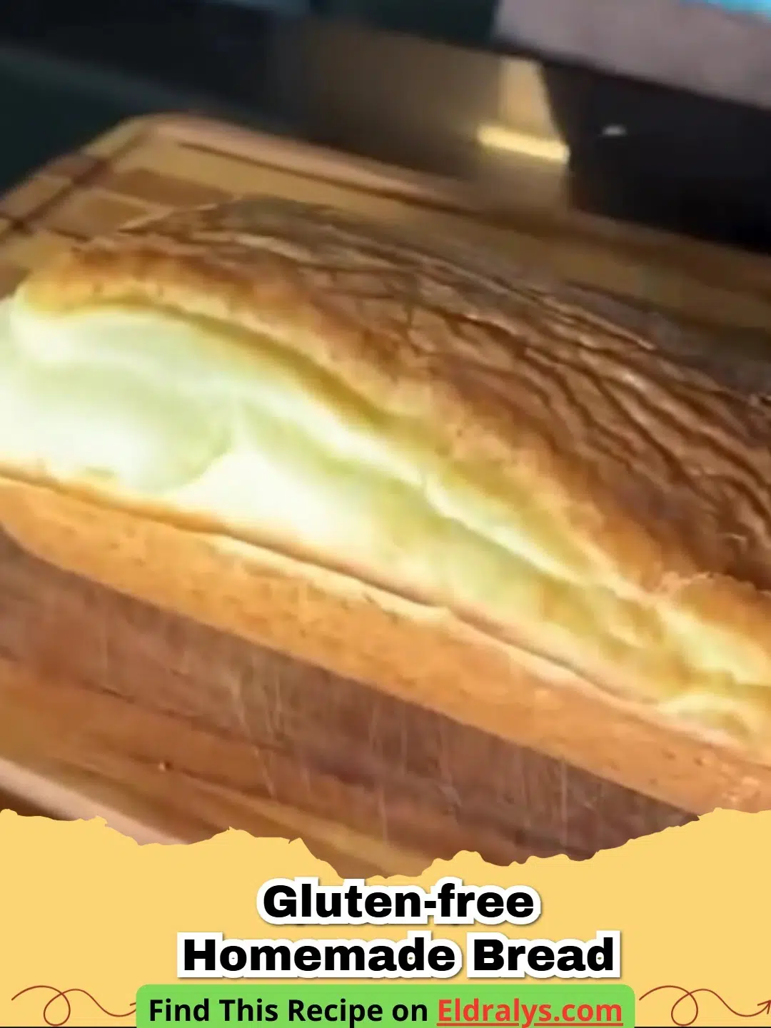 A soft golden loaf of Gluten-Free Cornstarch Bread on a wooden board