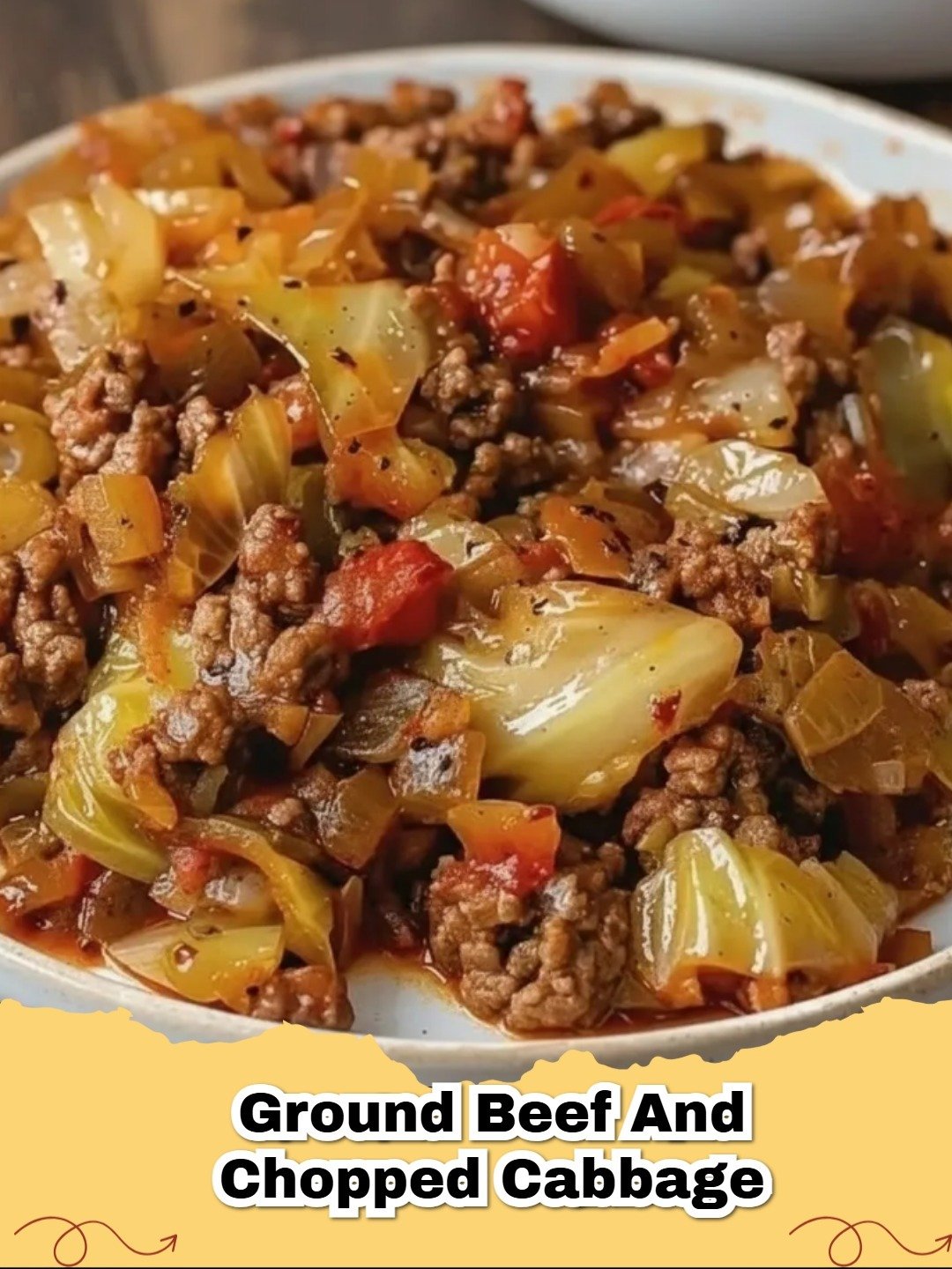 A steaming hot Ground Beef and Cabbage Skillet served in a cast iron pan.
