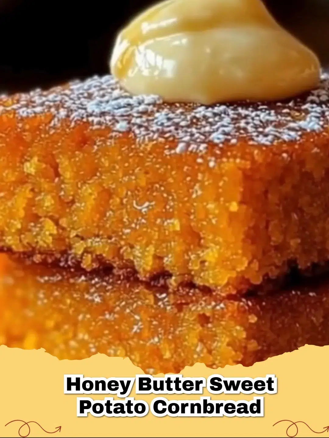 A close-up shot of Honey Butter Sweet Potato Cornbread in a cast iron skillet.