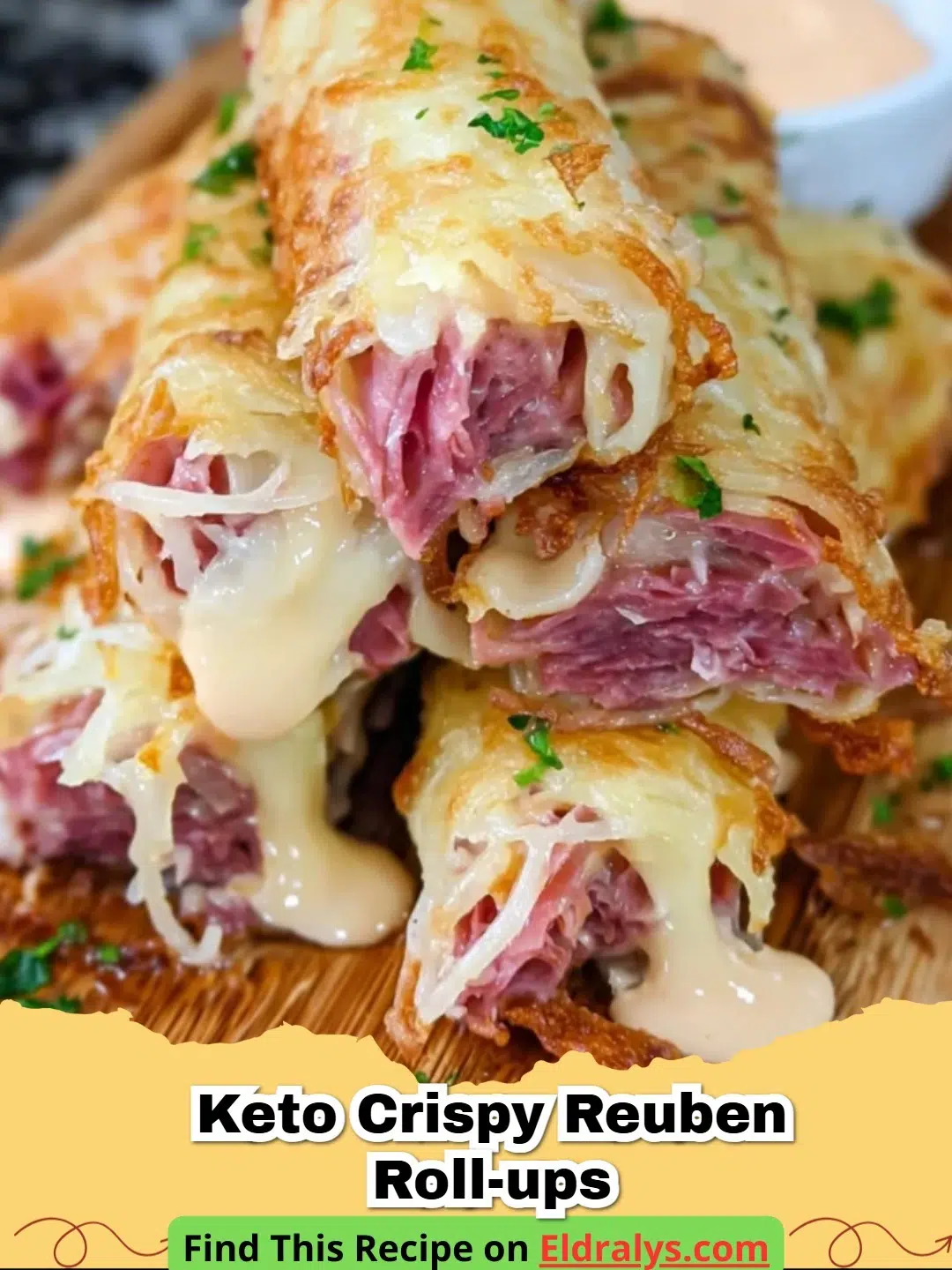 Close up of Keto Crispy Reuben Roll-Ups on a white platter with dipping sauce