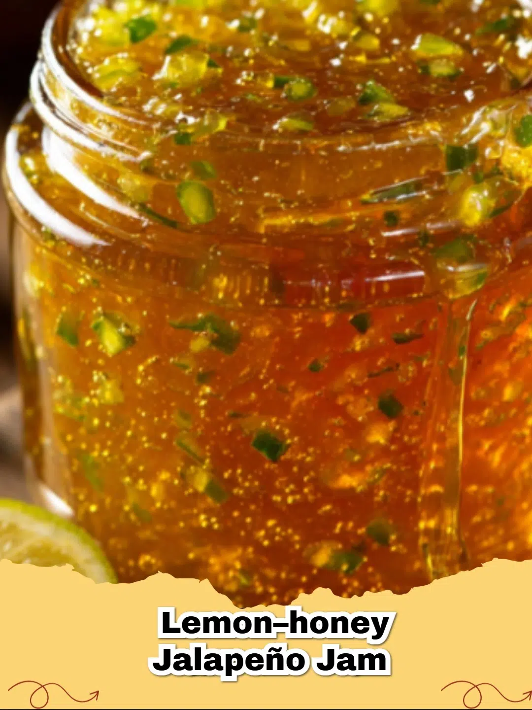 Homemade Lemon Honey Jalapeño Jam in a glass jar, garnished with fresh lemon slices and jalapeño peppers.