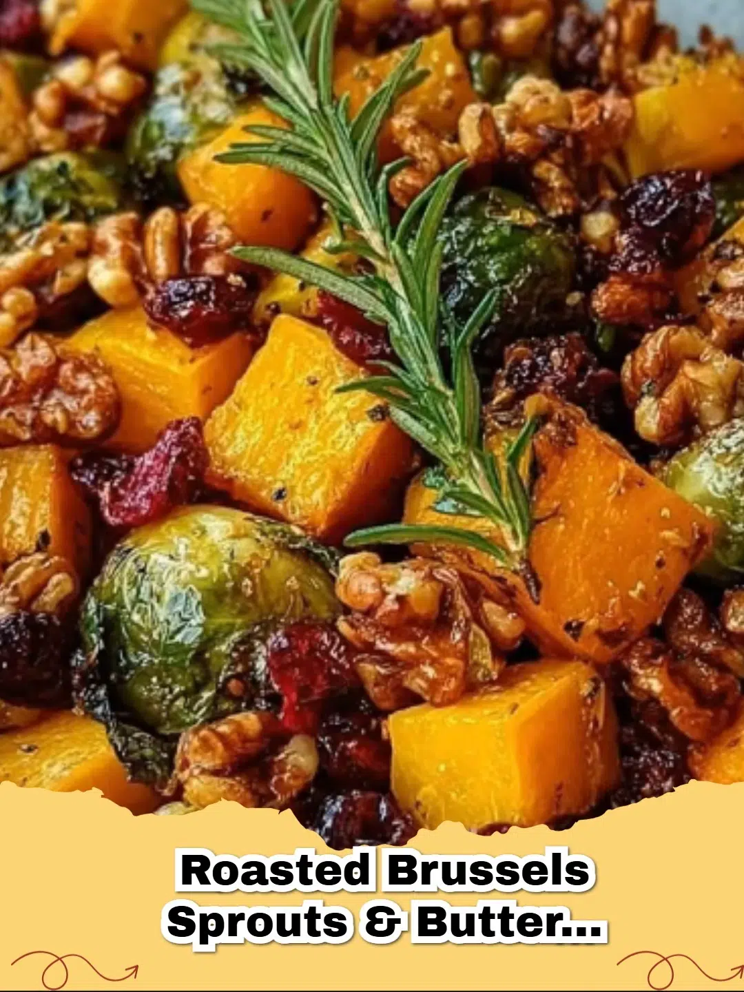 Close-up of roasted Brussels sprouts and butternut squash with maple walnuts and cranberries in a white serving bowl.
