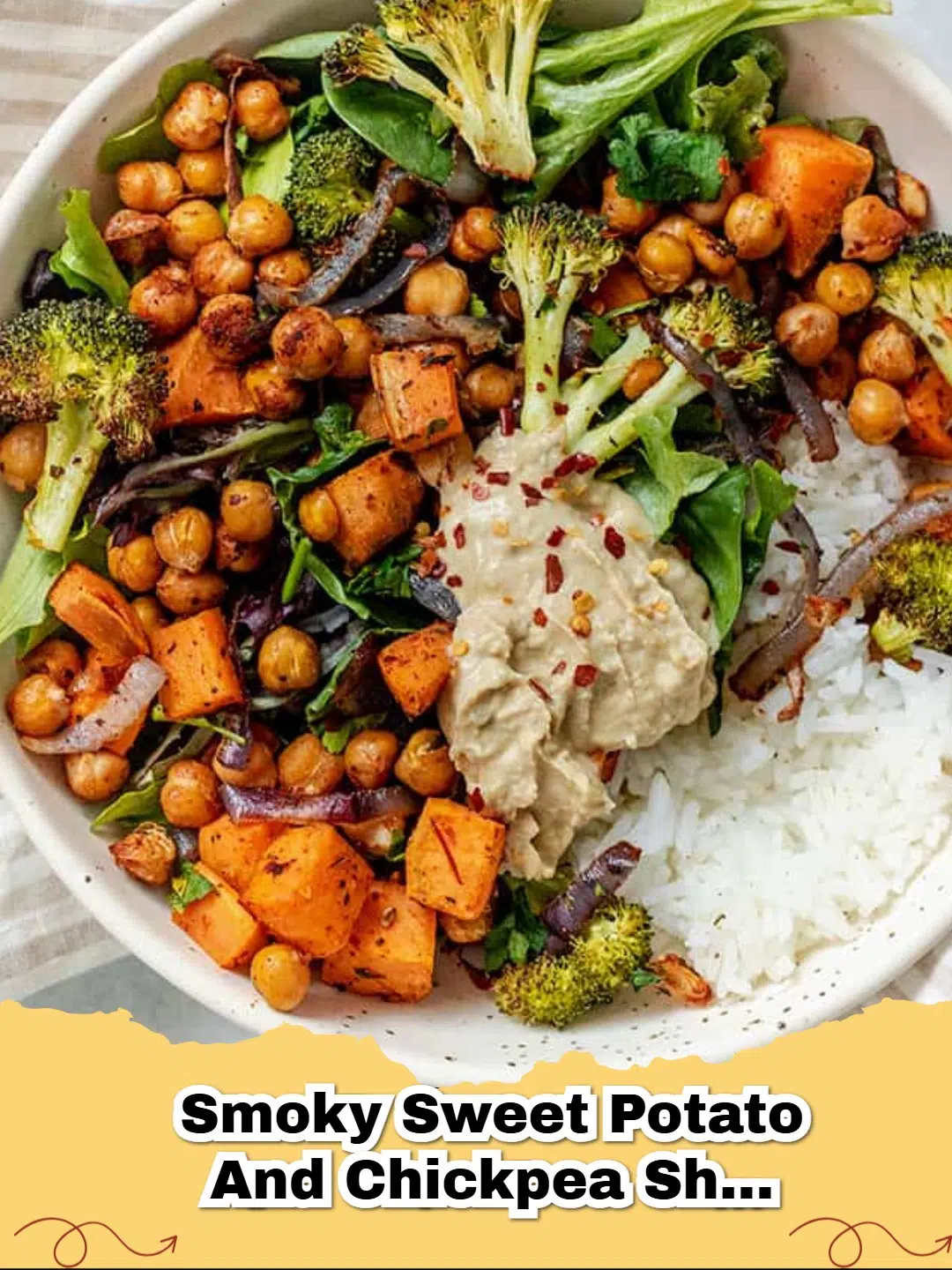 A delicious Smoky Sweet Potato and Chickpea Sheet Pan Dinner on a baking sheet