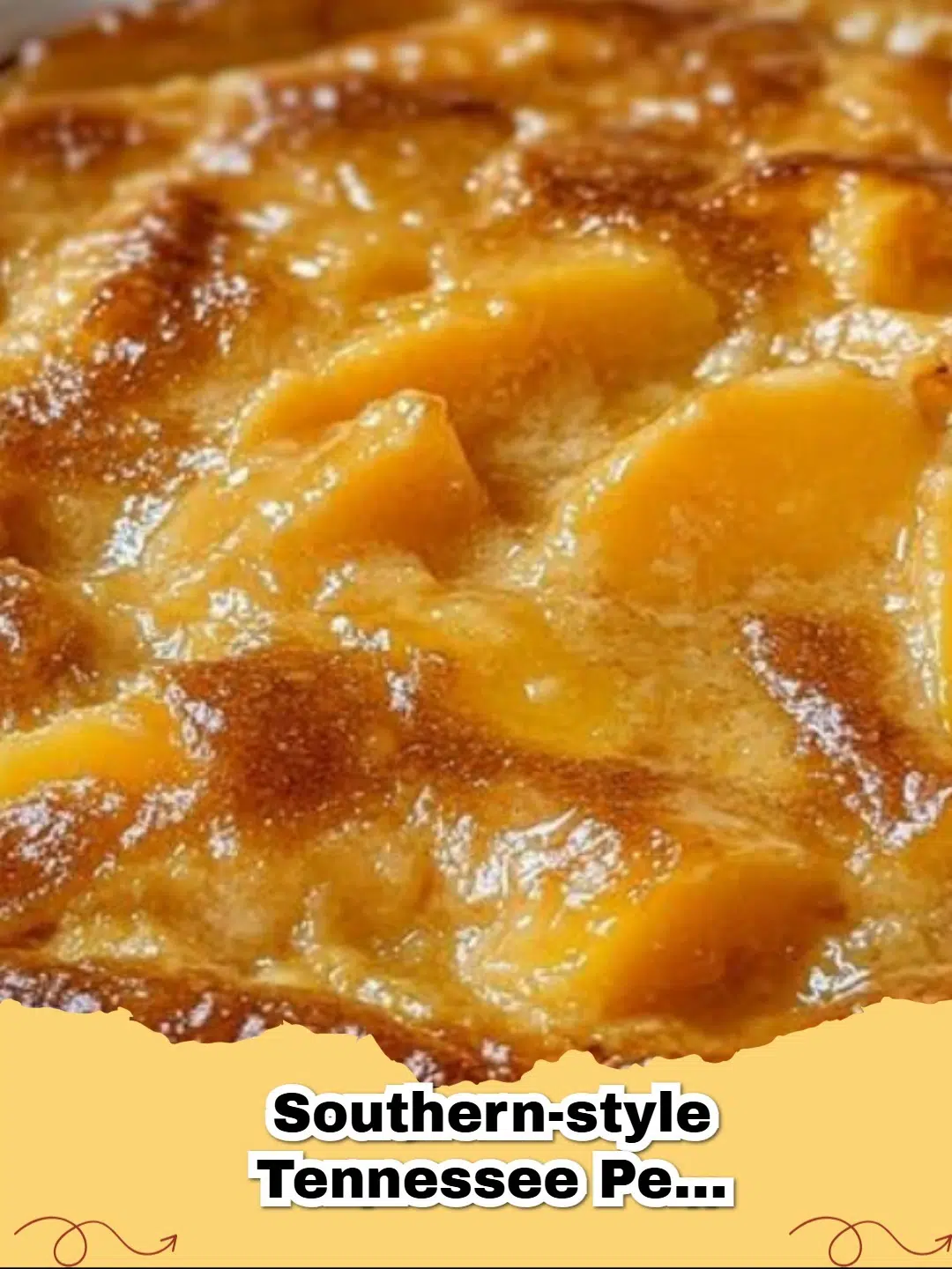 Southern-Style Tennessee Peach Pudding in a baking dish, garnished with fresh mint and a scoop of vanilla ice cream