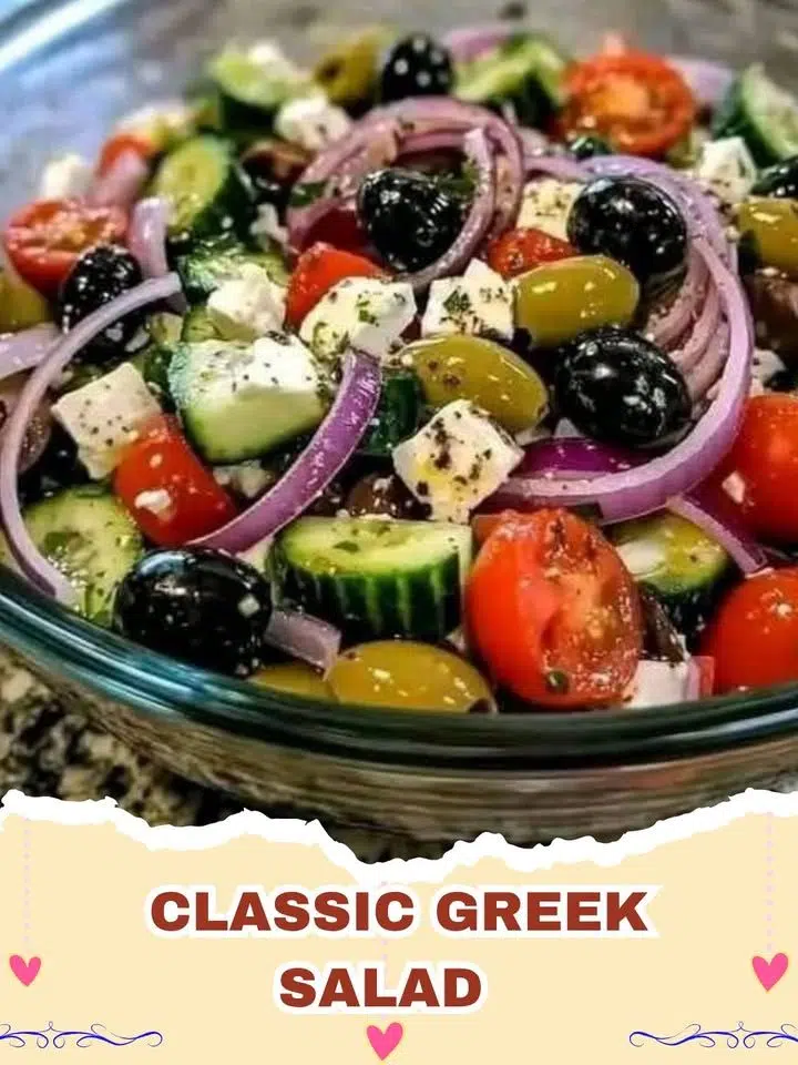 A vibrant bowl of Classic Greek Salad with tomatoes, cucumbers, olives, and feta.