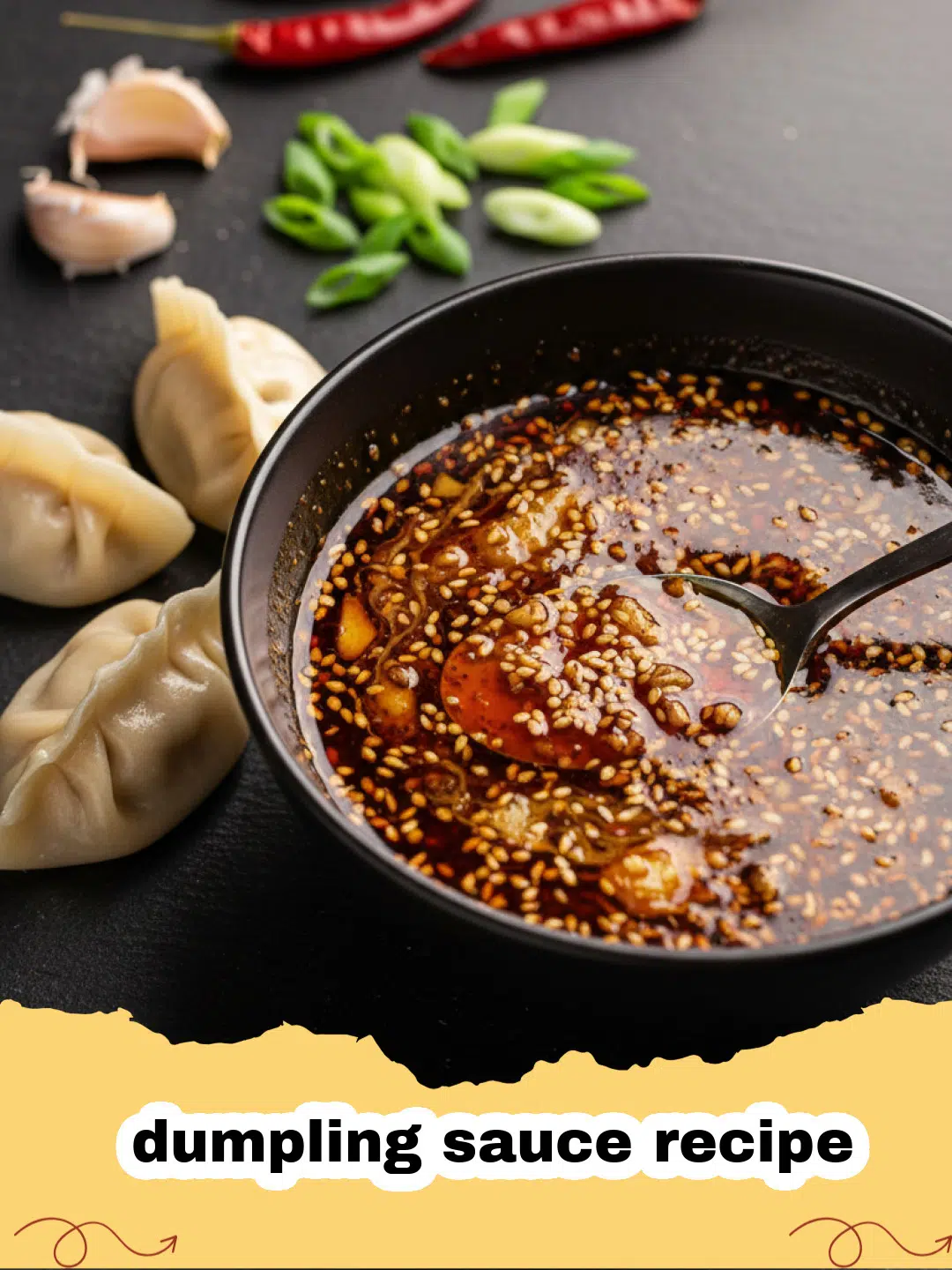 dumpling sauce recipe - A small bowl of dark, glossy dumpling sauce with chili flakes and green onions.