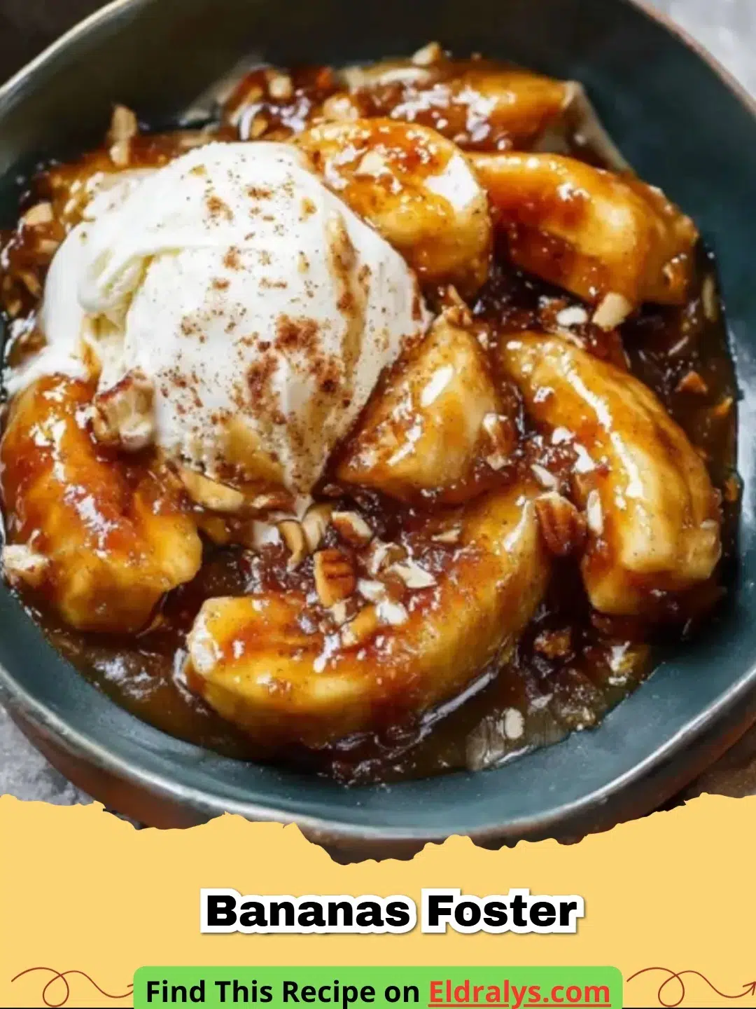 A close up of Bananas Foster being flambéed in a silver skillet with golden caramel sauce.