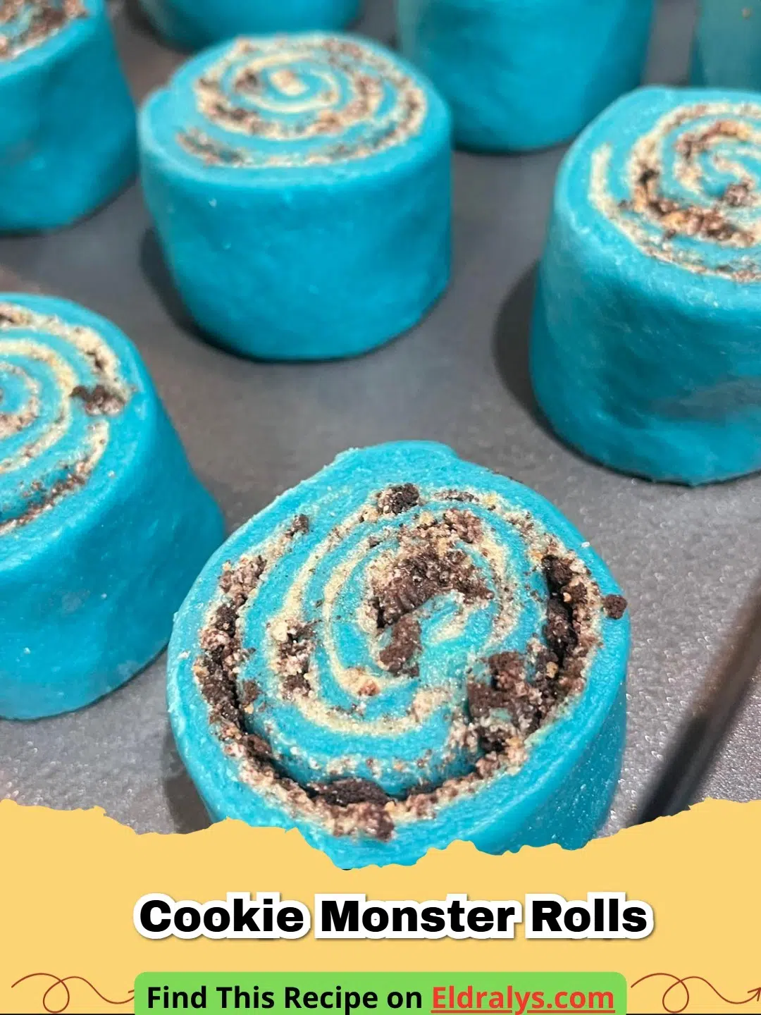 Blue Cookie Monster Cinnamon Rolls with Oreo and Chips Ahoy - A close-up of a vibrant Blue Cookie Monster Cinnamon Roll with Oreo and Chips Ahoy toppings.