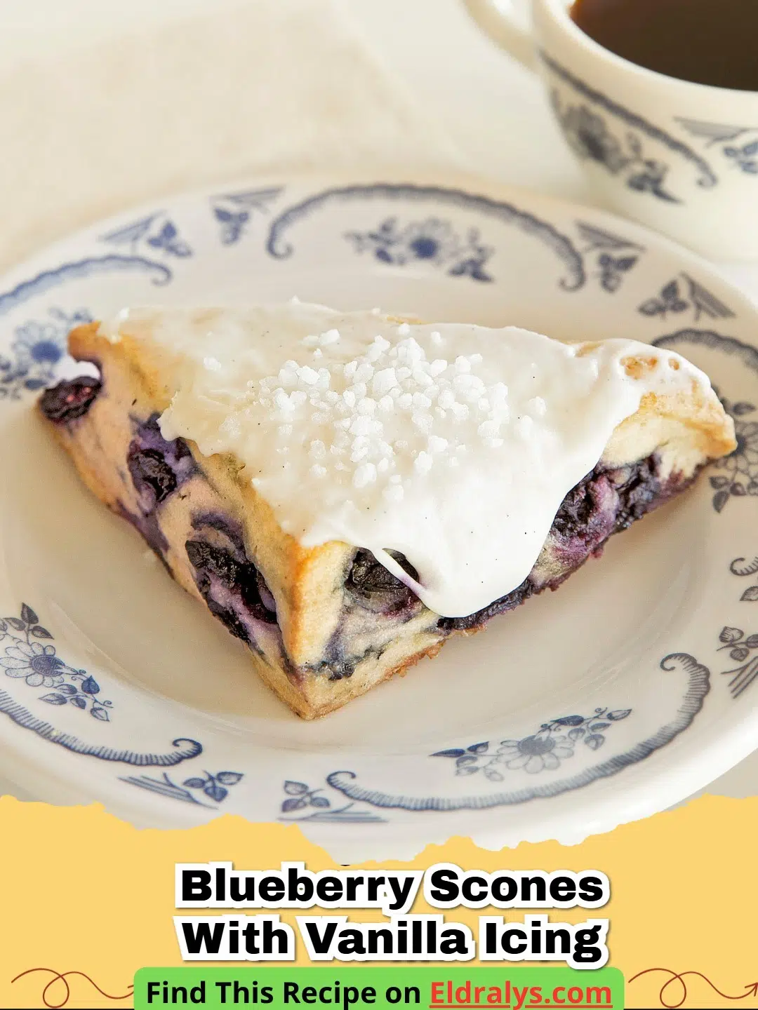 A close-up shot of freshly baked Blueberry Scones with Vanilla Icing on a wire rack.