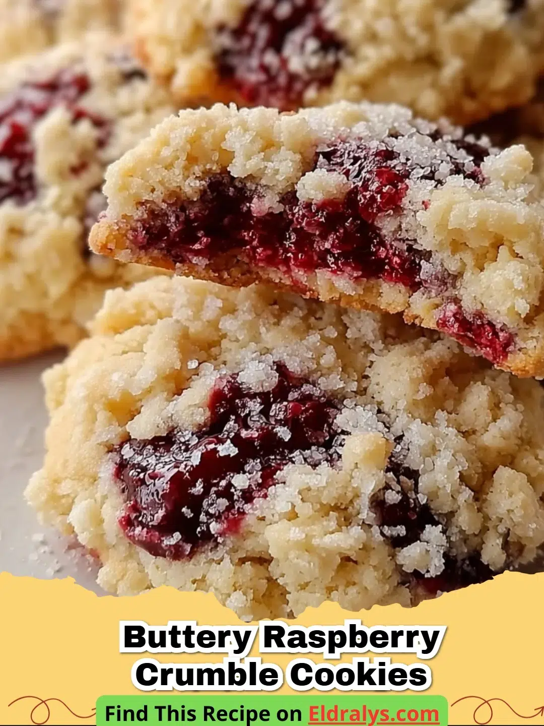 Close up of Buttery Raspberry Crumble Cookies showing the jam layer and golden crumble