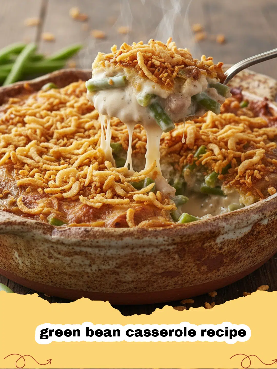 green bean casserole recipe - A close-up shot of a bubbling green bean casserole topped with golden brown fried onions in a white ceramic dish.