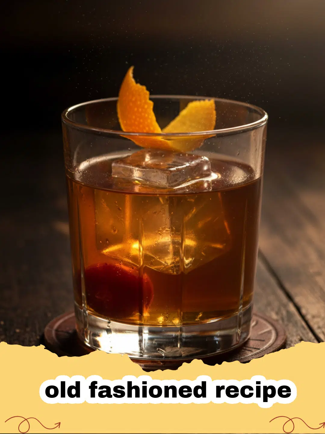 old fashioned recipe - A classic old fashioned cocktail in a rocks glass with a large ice cube and orange peel garnish.
