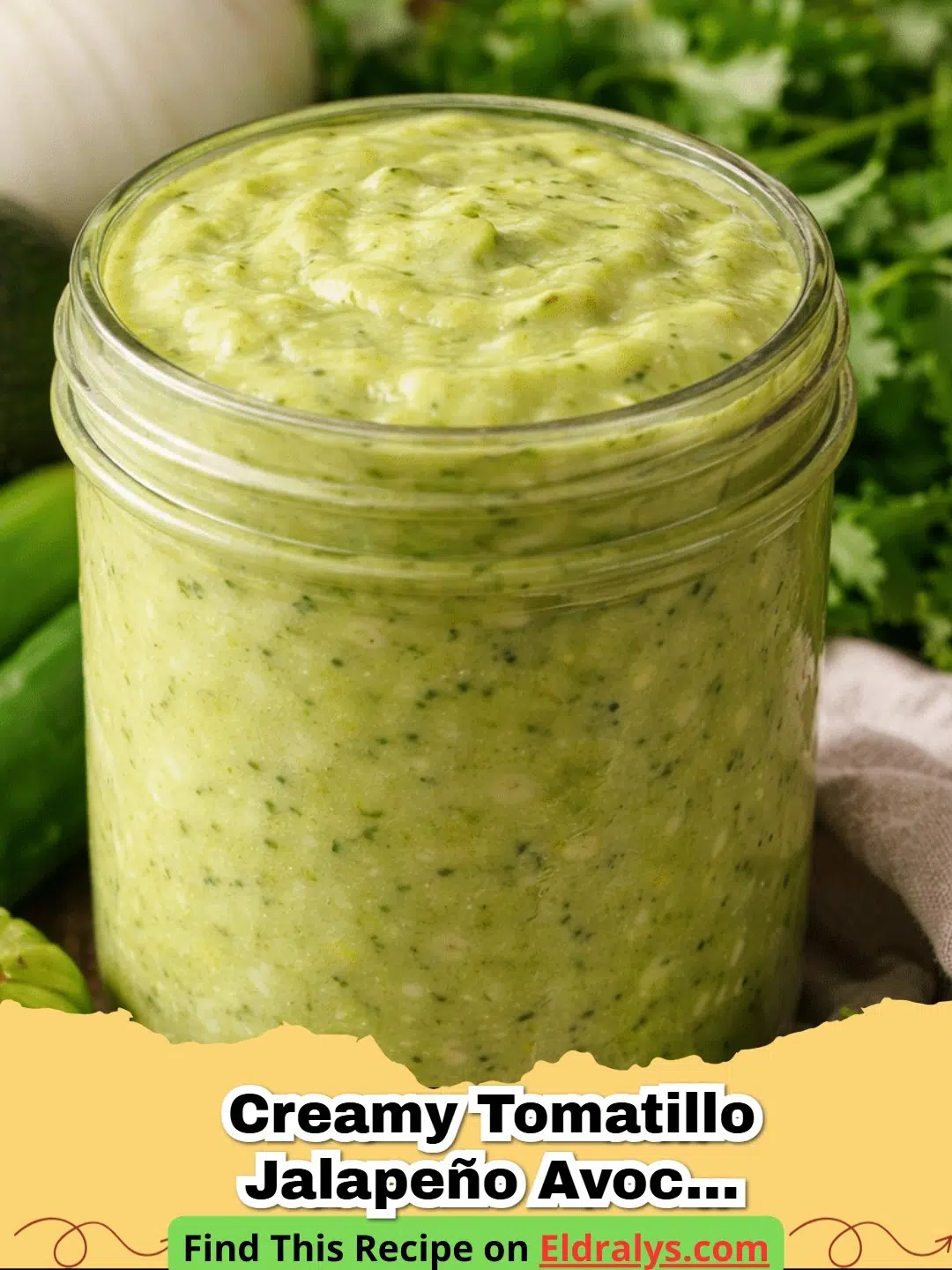 A bowl of smooth and vibrant Creamy Tomatillo Jalapeño Avocado Salsa served with tortilla chips.