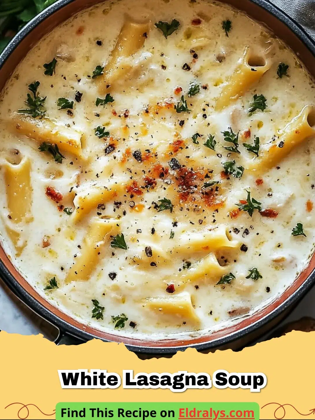 A bowl of Creamy White Lasagna Soup topped with ricotta and parmesan cheese.