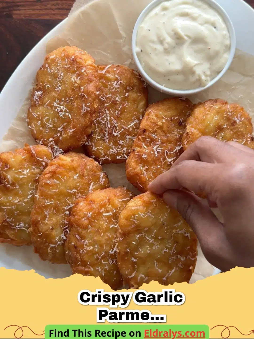 Golden brown crispy garlic parmesan hashbrowns in a cast iron skillet