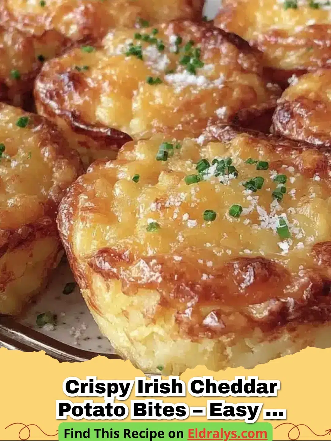 A plate of golden-brown Crispy Irish Cheddar Potato Bites garnished with fresh chives.