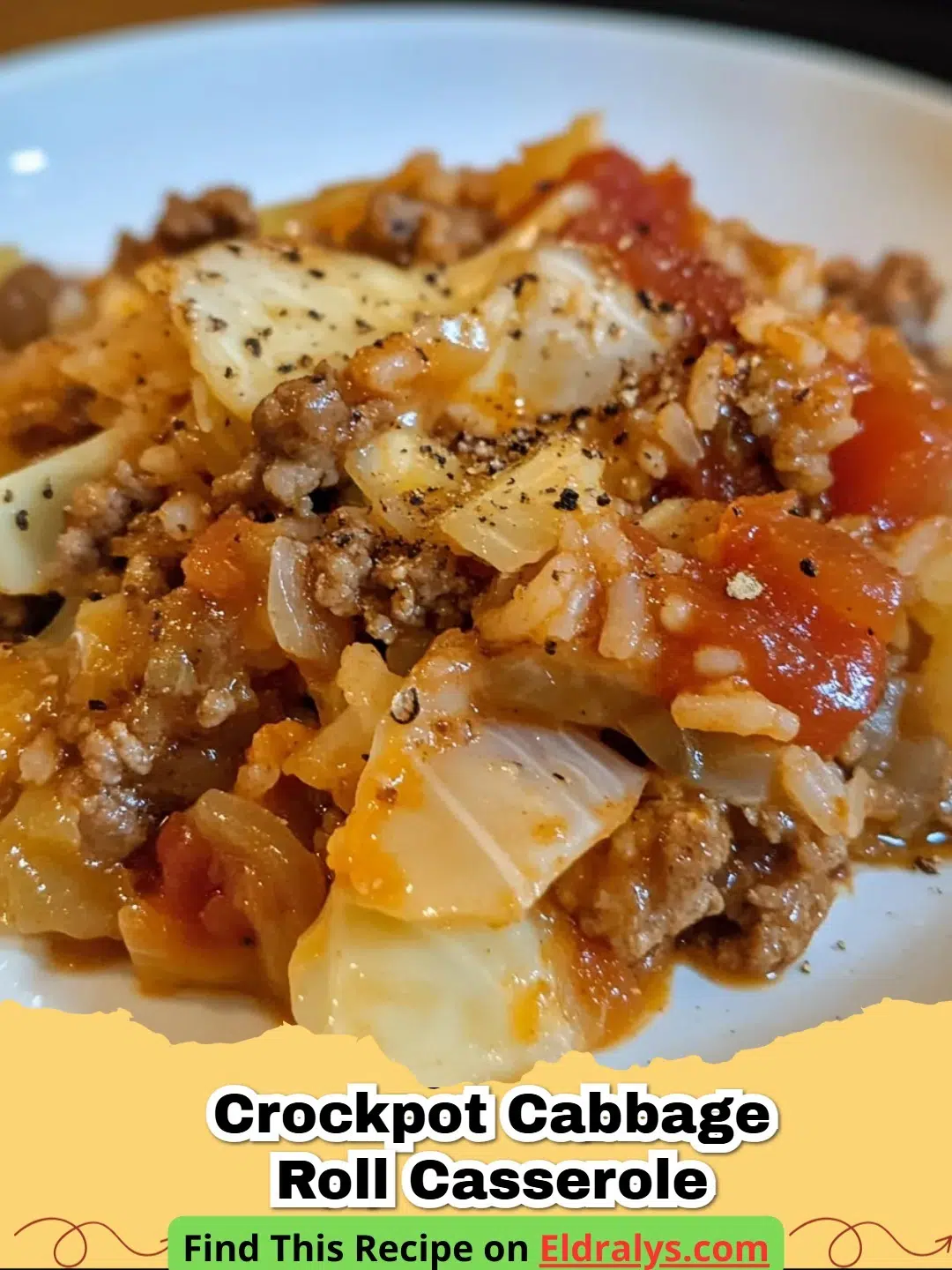 A close up shot of a hearty Crockpot Cabbage Roll Casserole in a slow cooker with steam rising.