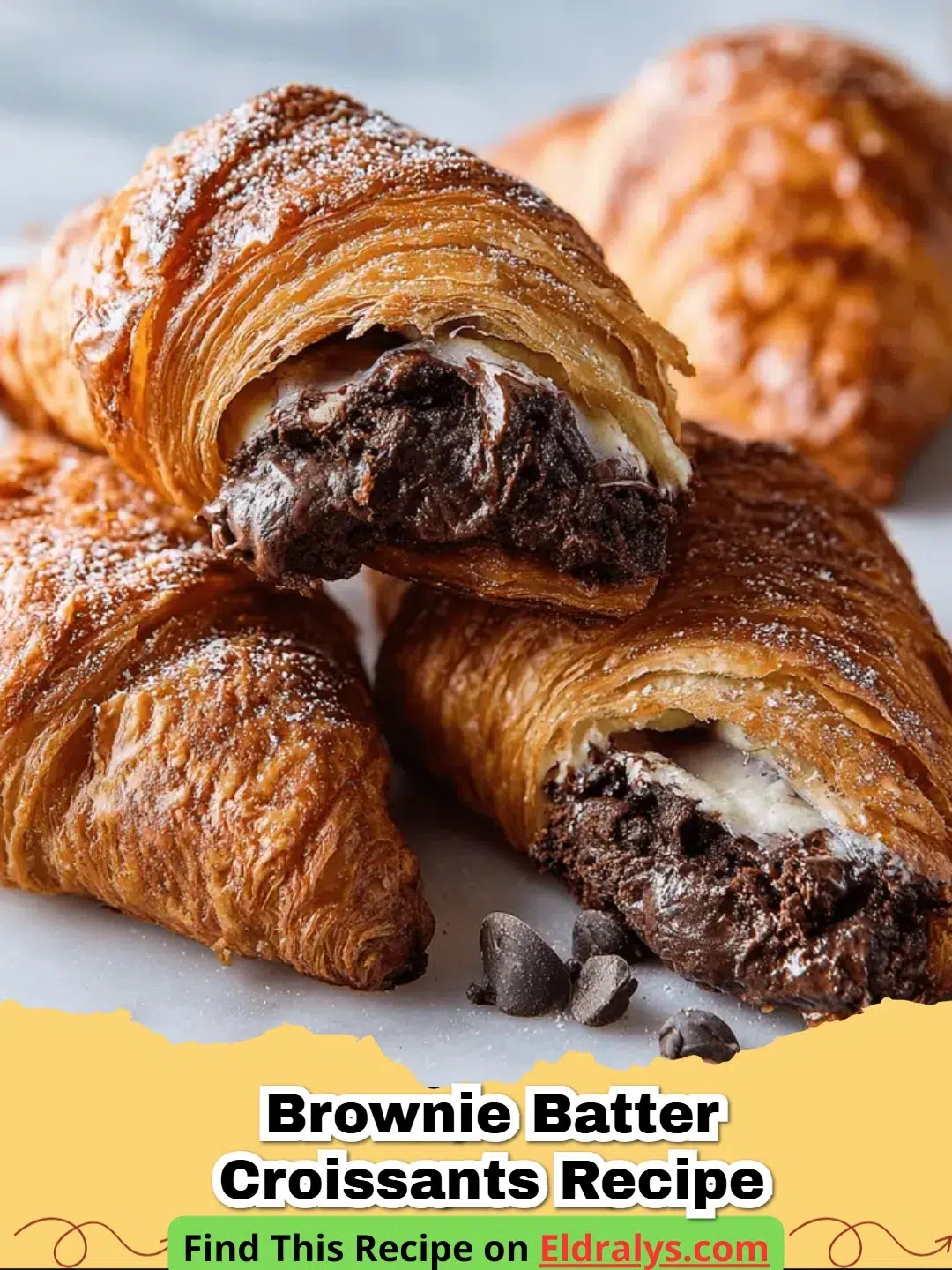 A plate of fresh Brownie Batter Croissants showing a gooey chocolate center