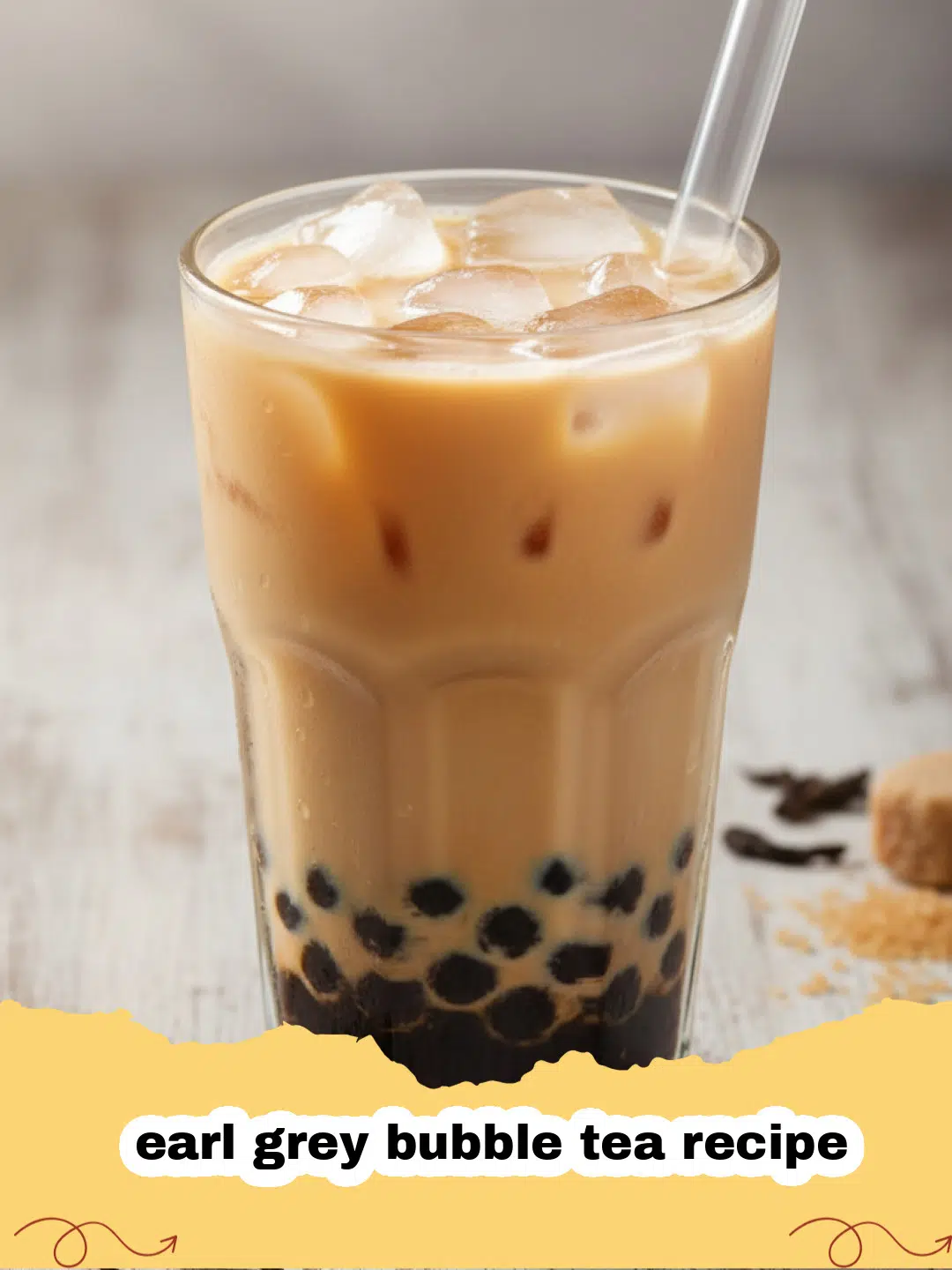 earl grey bubble tea recipe - A tall glass of Earl Grey bubble tea with black boba pearls at the bottom and a creamy milk swirl.