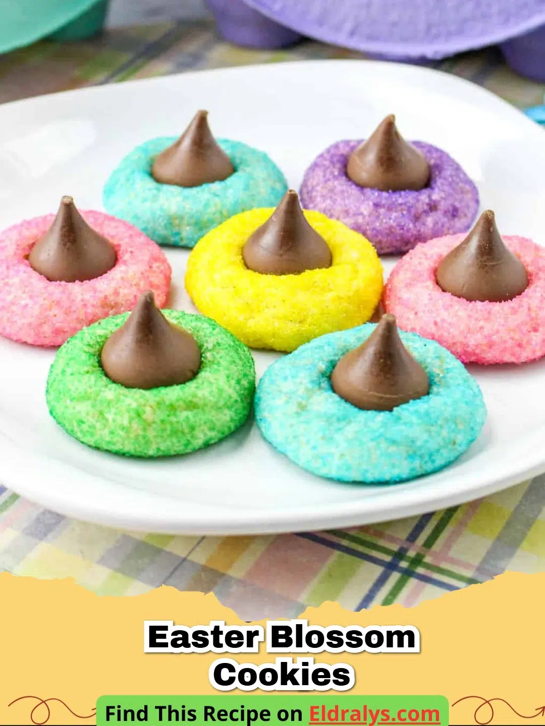 A tray of colorful Easter Blossom Cookies rolled in pastel sugar and topped with chocolate kisses.