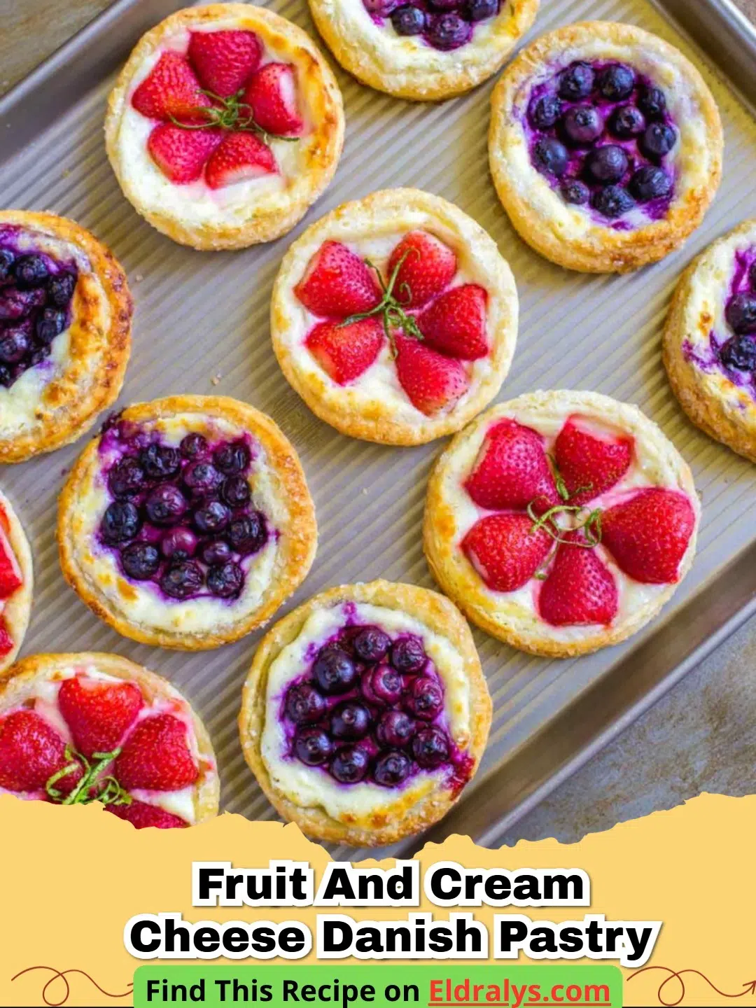 Golden brown Easy Berry and Cream Cheese Puff Pastry Danishes topped with fresh strawberries and blueberries.