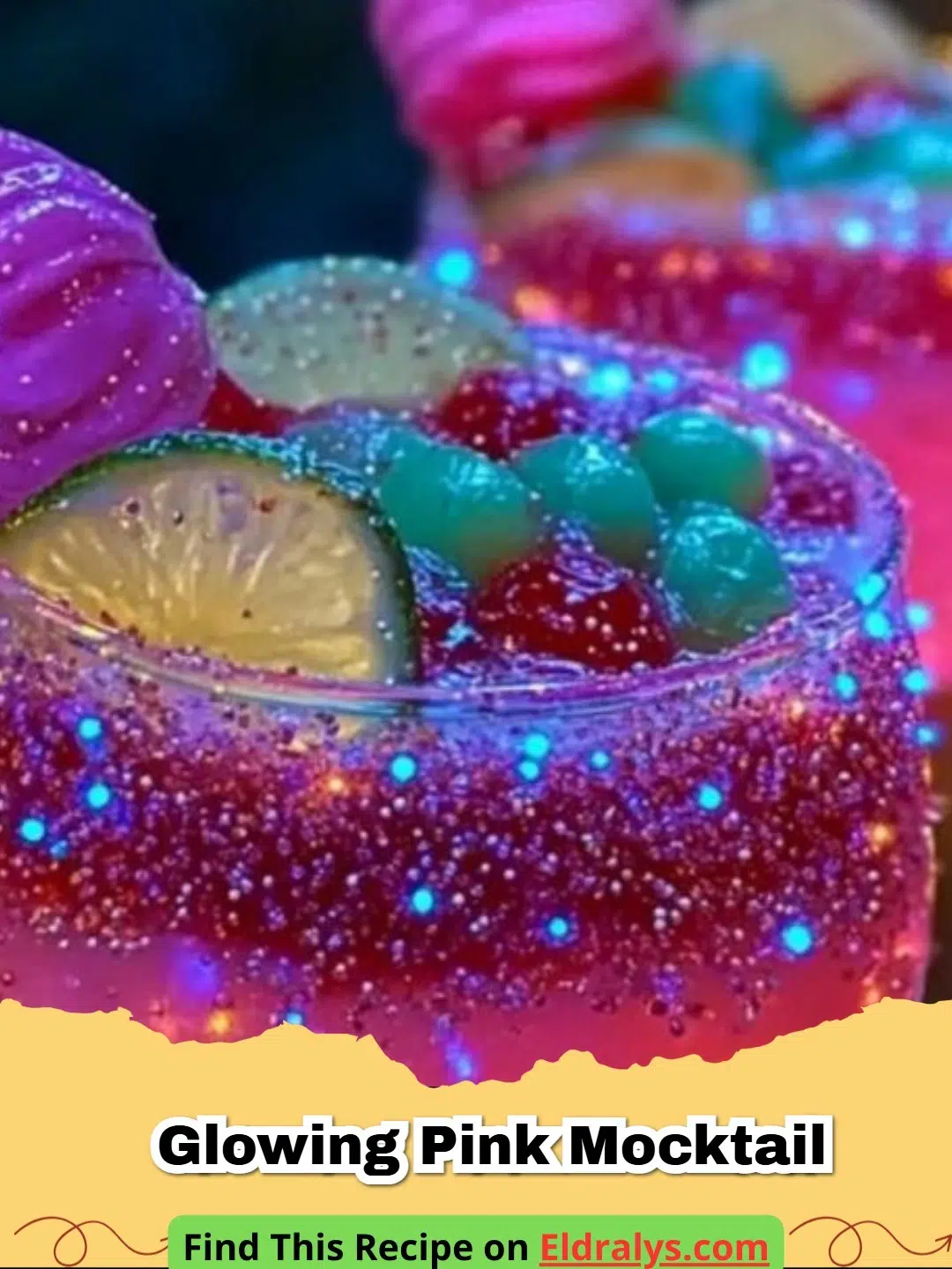 A vibrant Glowing Pink Mocktail Recipe served in a tall glass with fresh mint and berries.