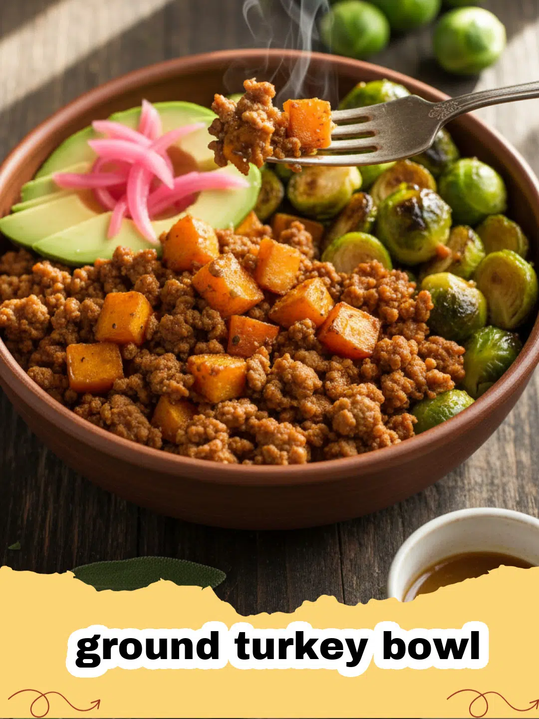 A colorful ground turkey bowl with rice, carrots, and green onions