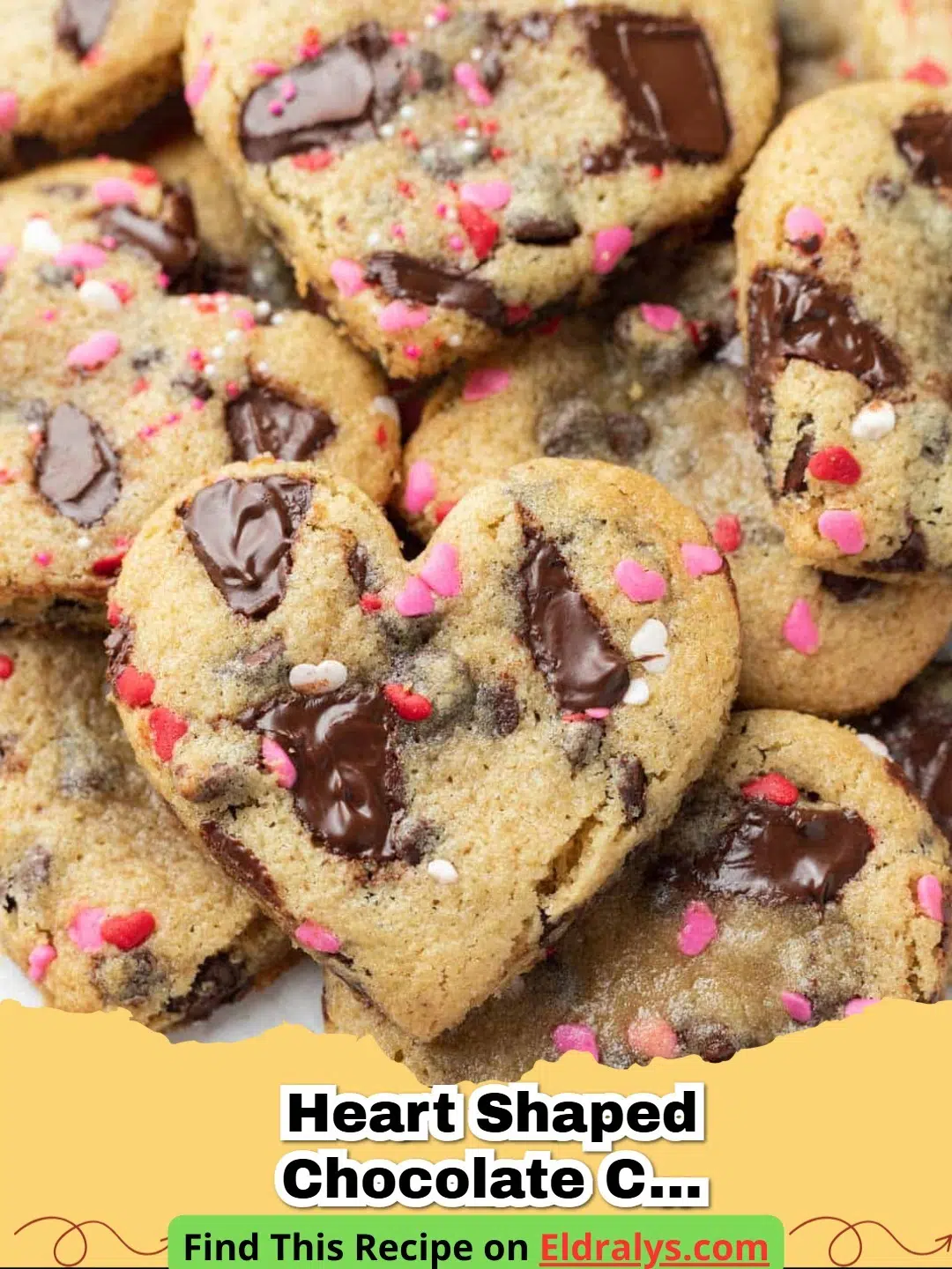 Batch of freshly baked Heart-Shaped Chocolate Chip Cookies on a cooling rack