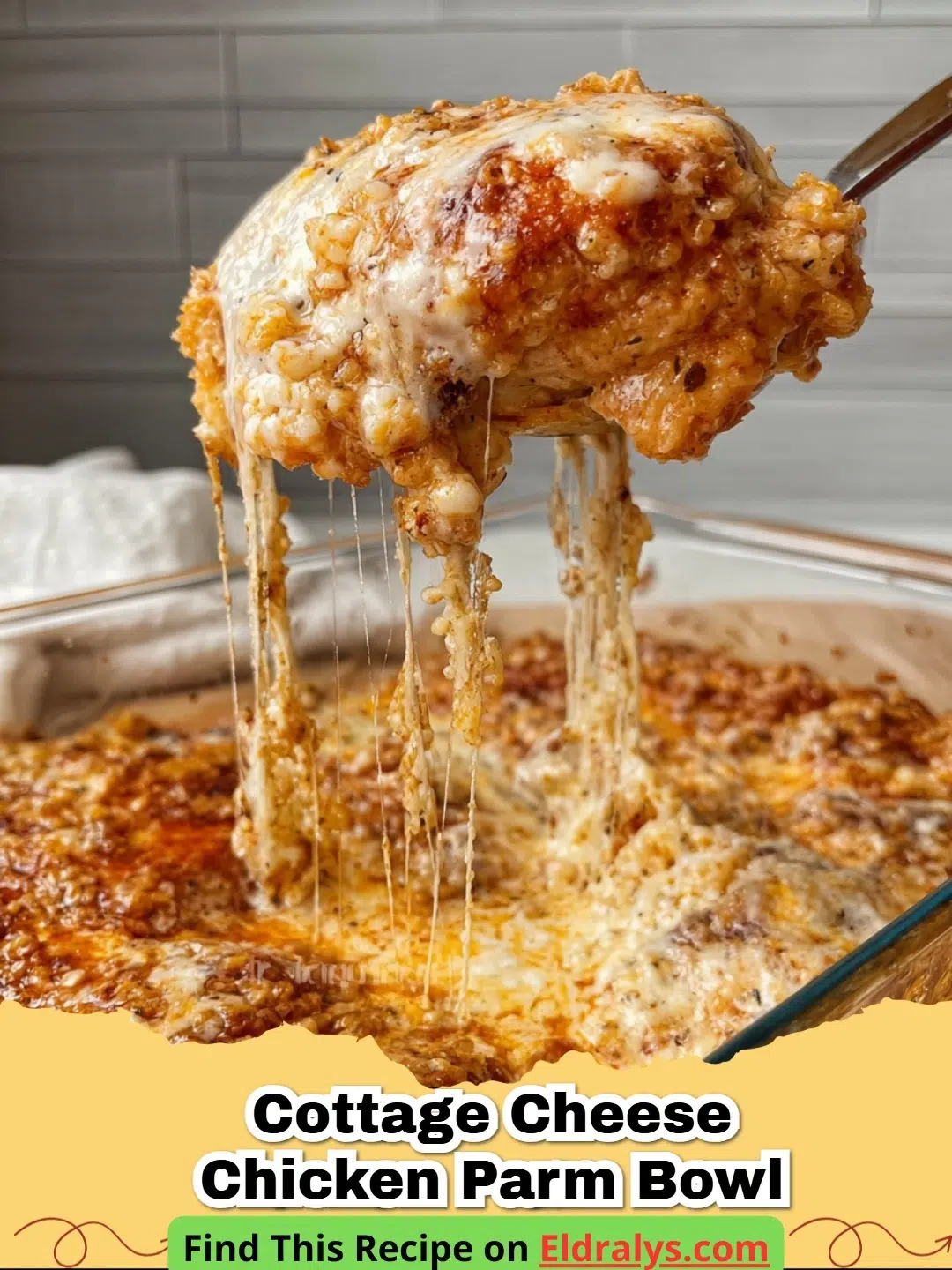 A High-Protein Cottage Cheese Chicken Parmesan Bowl with melted cheese and red marinara sauce.
