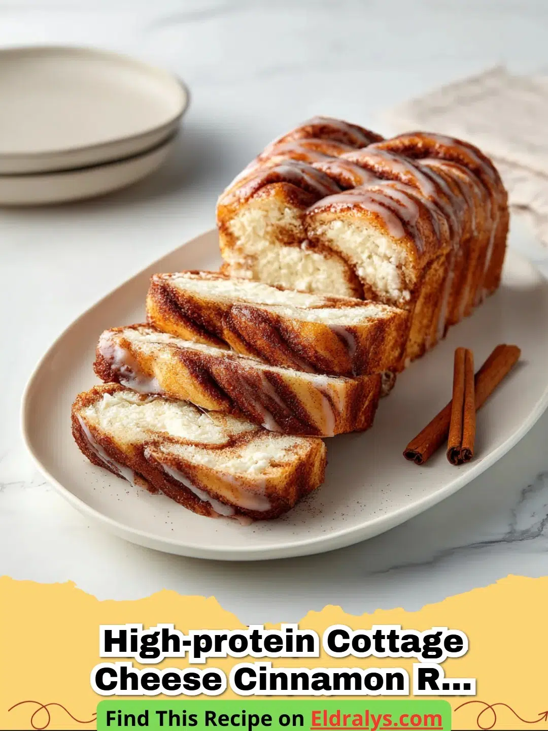 A close-up shot of a sliced High-Protein Cottage Cheese Cinnamon Roll Bread with a visible cinnamon swirl.