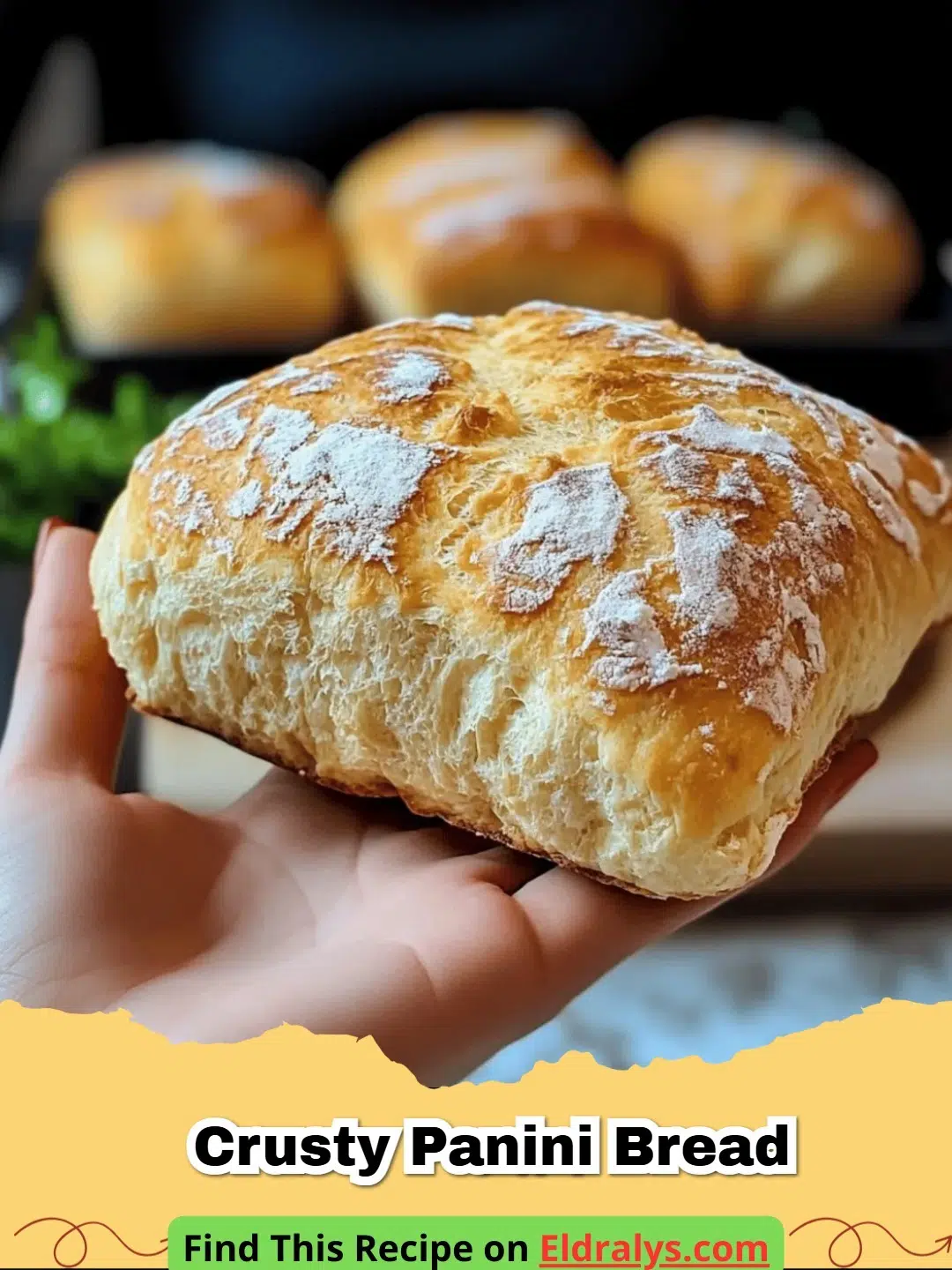 Homemade Crusty Panini Bread Recipe - Freshly baked Homemade Crusty Panini Bread on a wooden board with air pockets visible in the crumb.