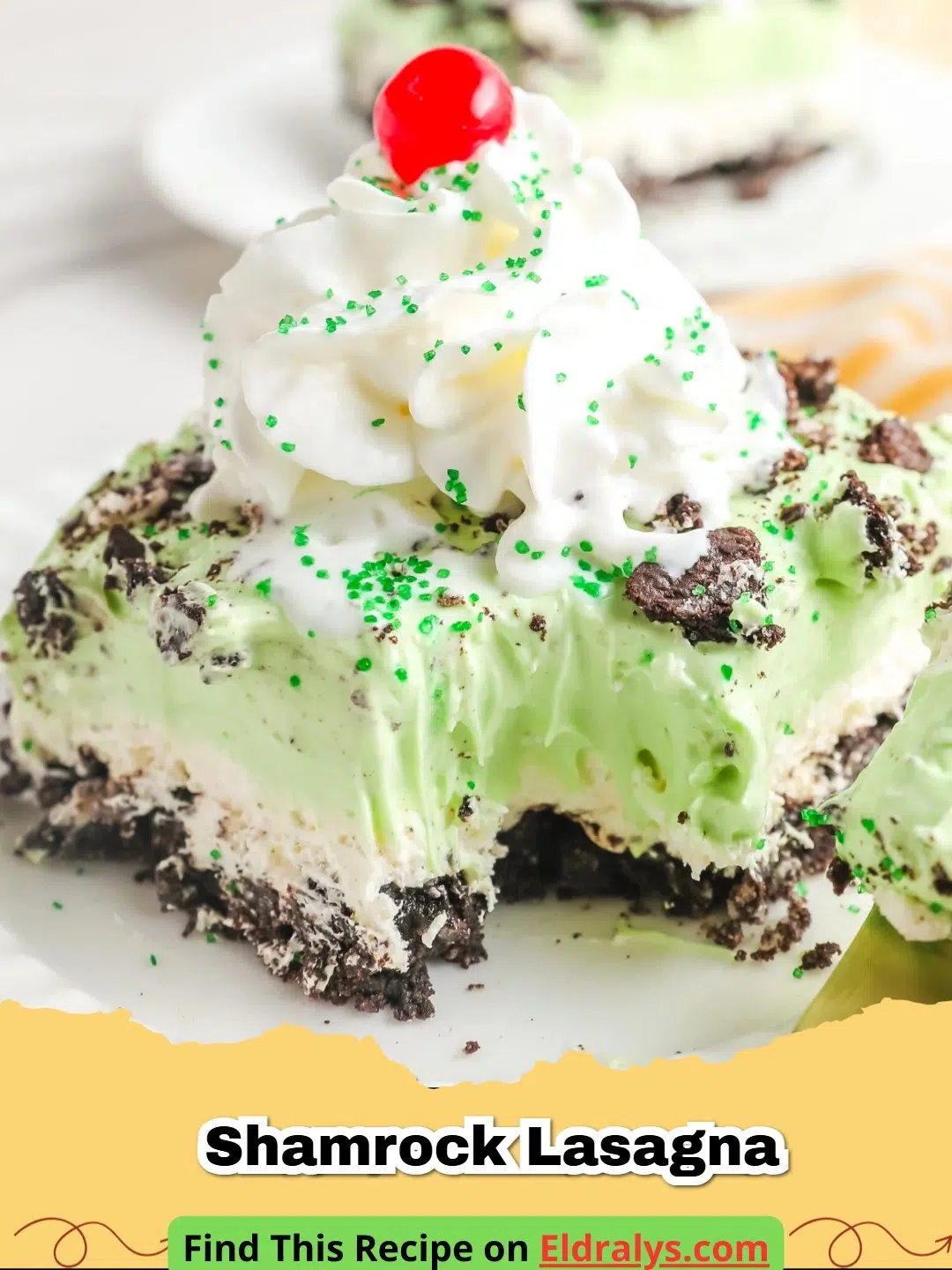 Slices of No-Bake Mint Oreo Dessert Lasagna showing green and white layers on an Oreo crust.