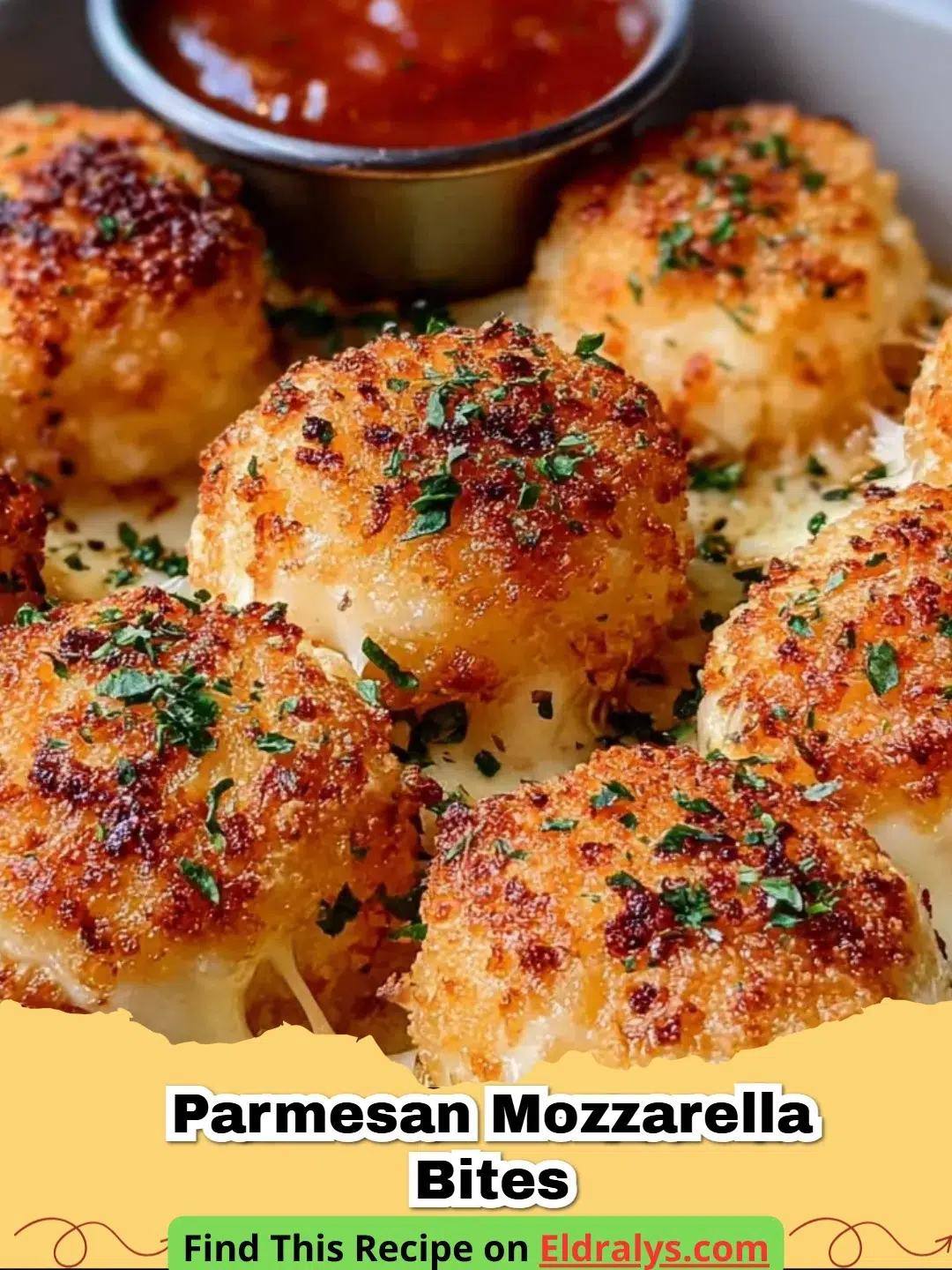 A close-up shot of crispy golden-brown Parmesan Mozzarella Bites with a visible cheese pull.