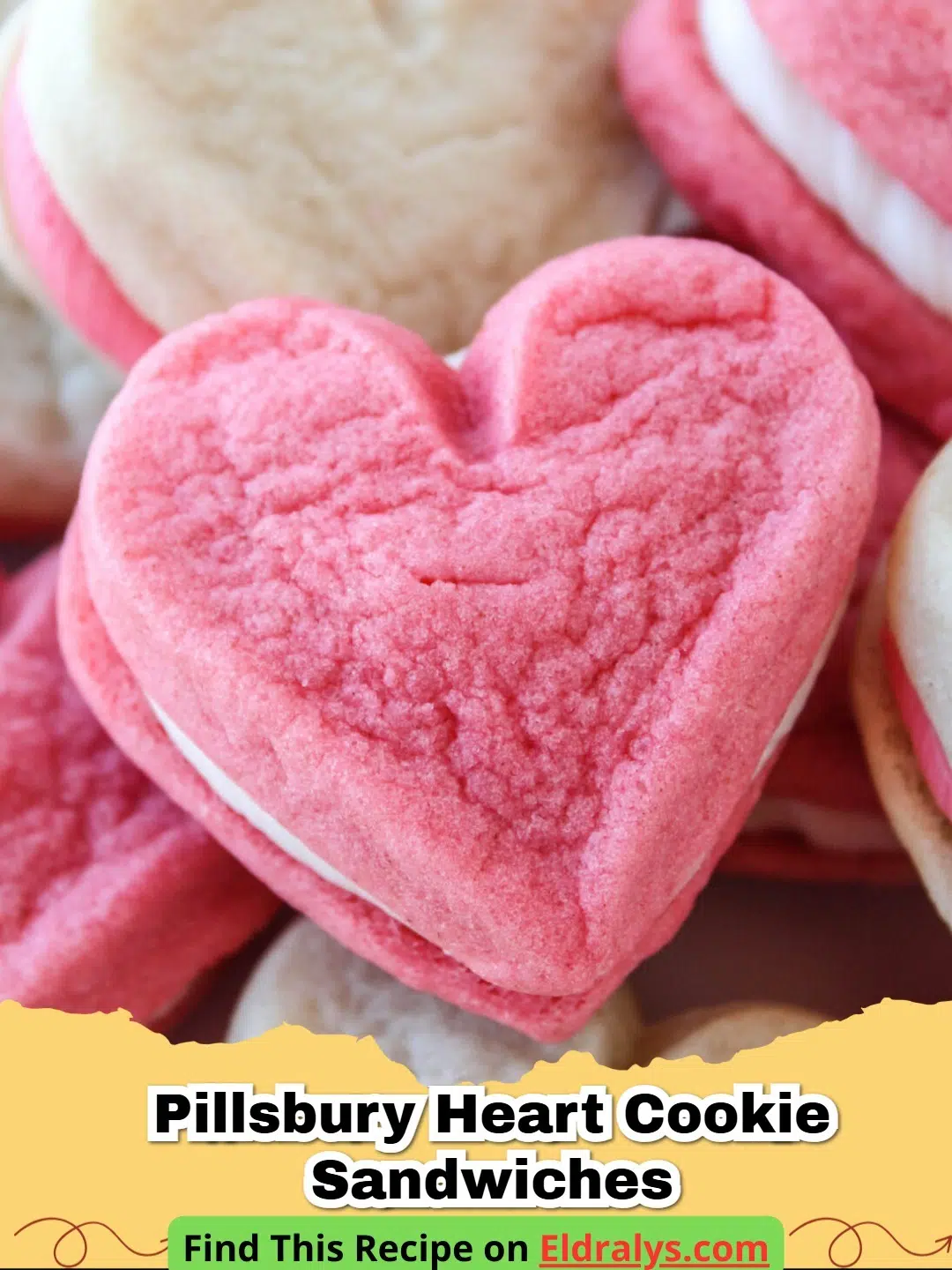 A close up shot of Pillsbury Heart Cookie Sandwiches with pink frosting and sprinkles
