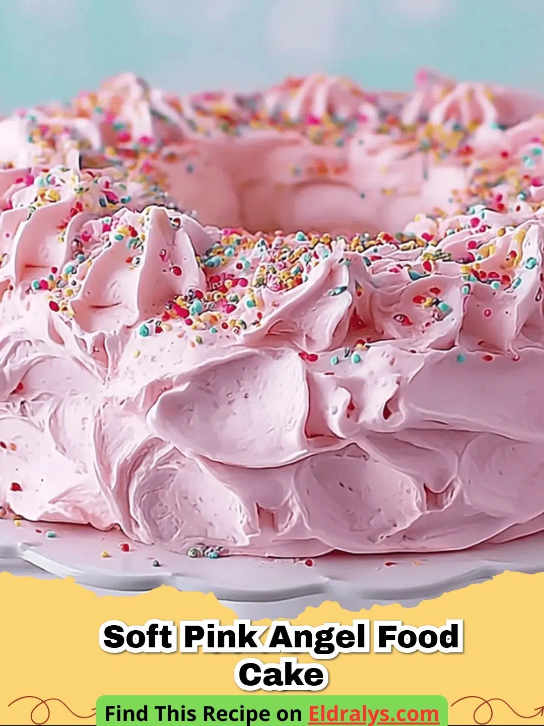 A tall Pink Angel Food Cake with Marshmallow Frosting on a cake stand