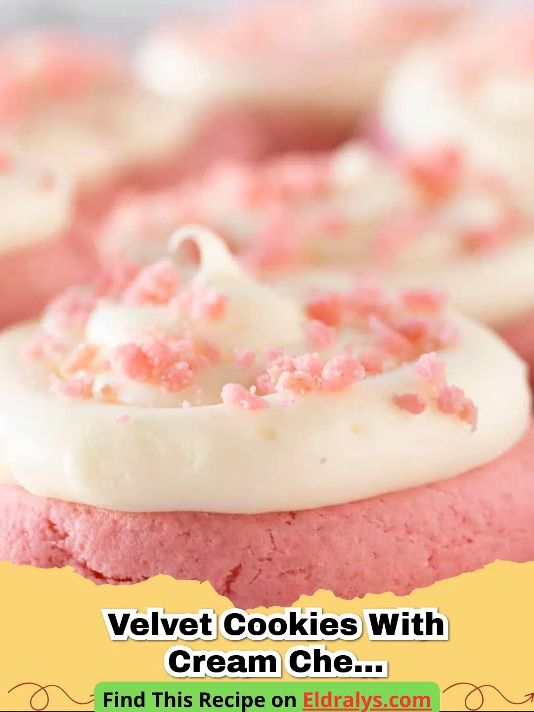 Batch of Pink Velvet Cookies with Cream Cheese Frosting on a cooling rack.