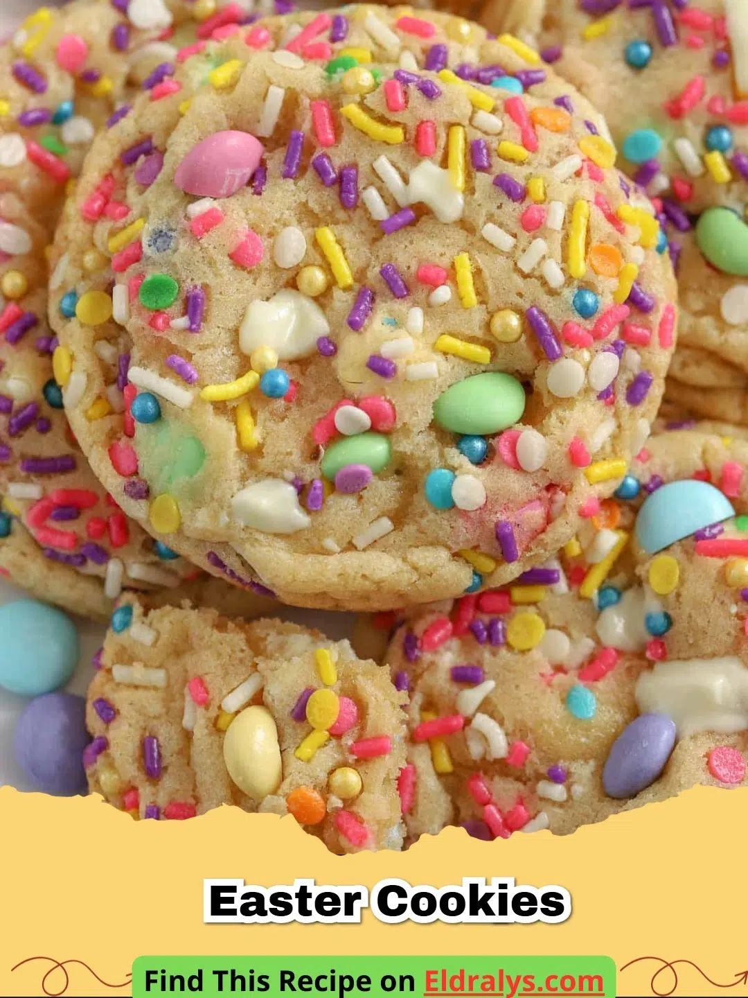 A tray of Soft and Chewy Easter M&M Cookies with pastel candies and sprinkles.