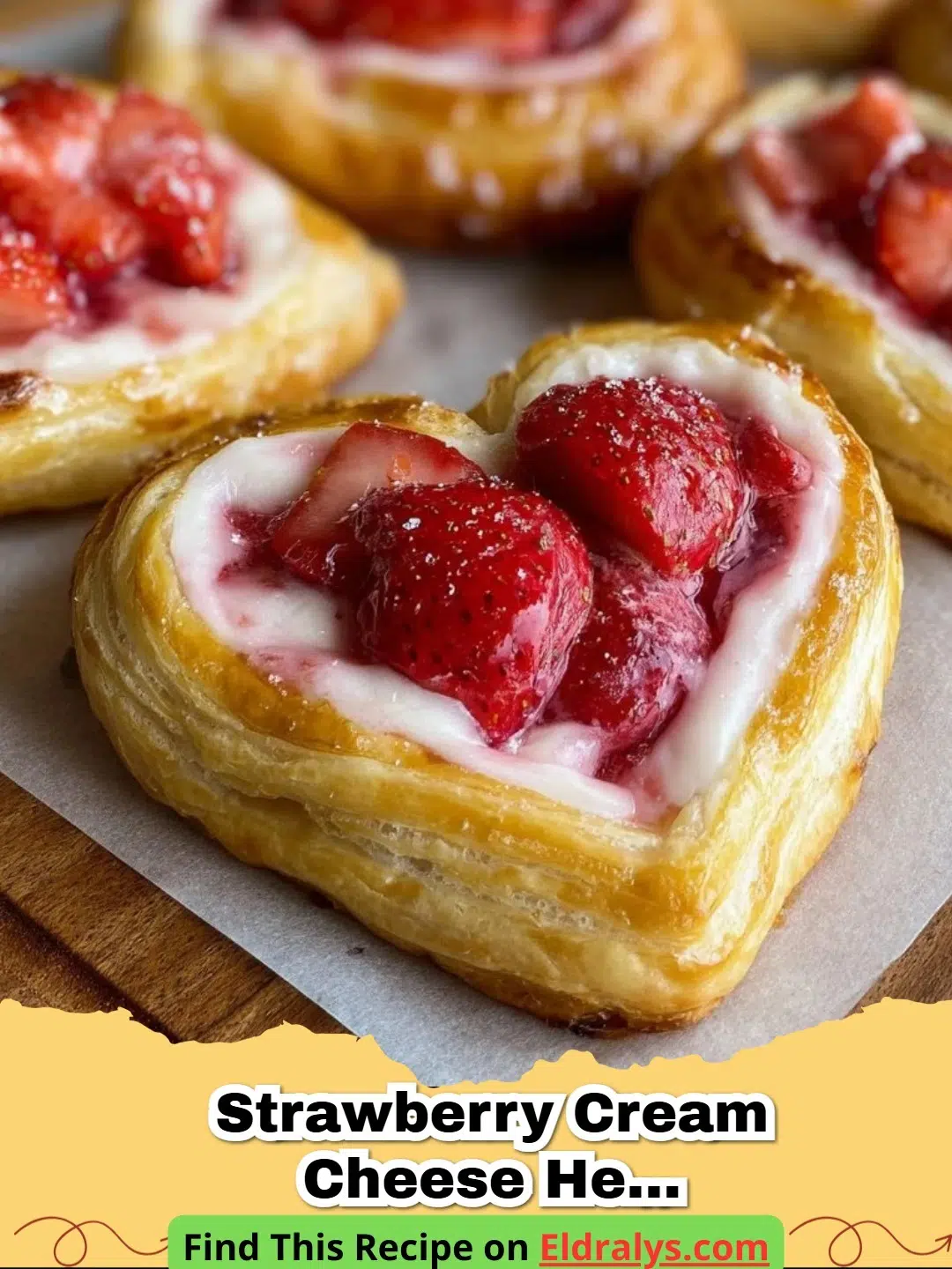 Golden brown Strawberry Cream Cheese Heart Danishes topped with fresh fruit